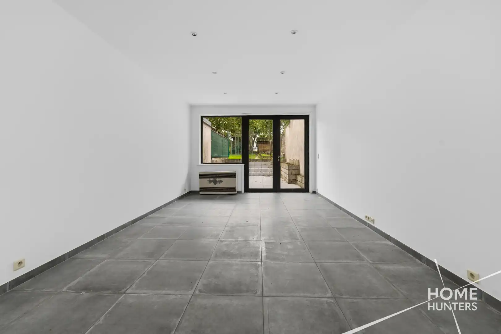 Charmante woning met zuidgerichte tuin in hartje Heuvelland foto 12