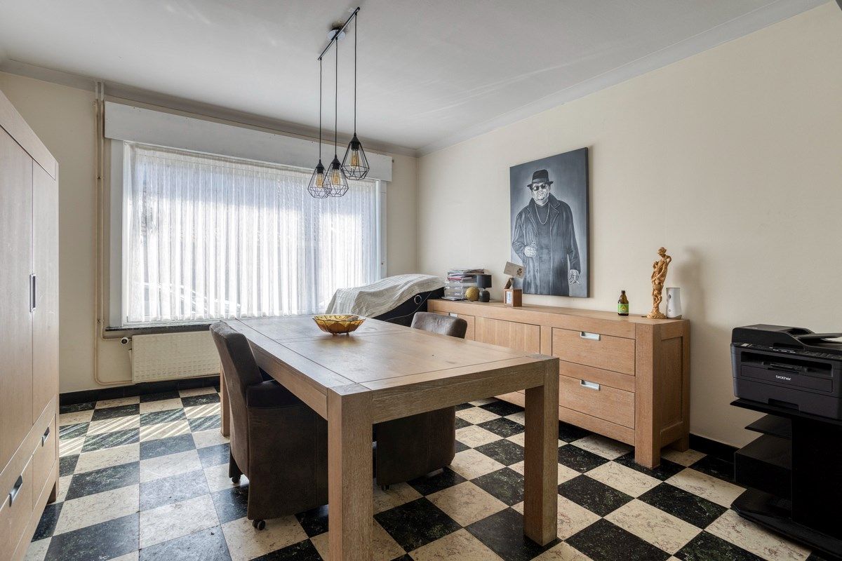 Te renoveren woning met naastliggend bouwperceel! foto 4