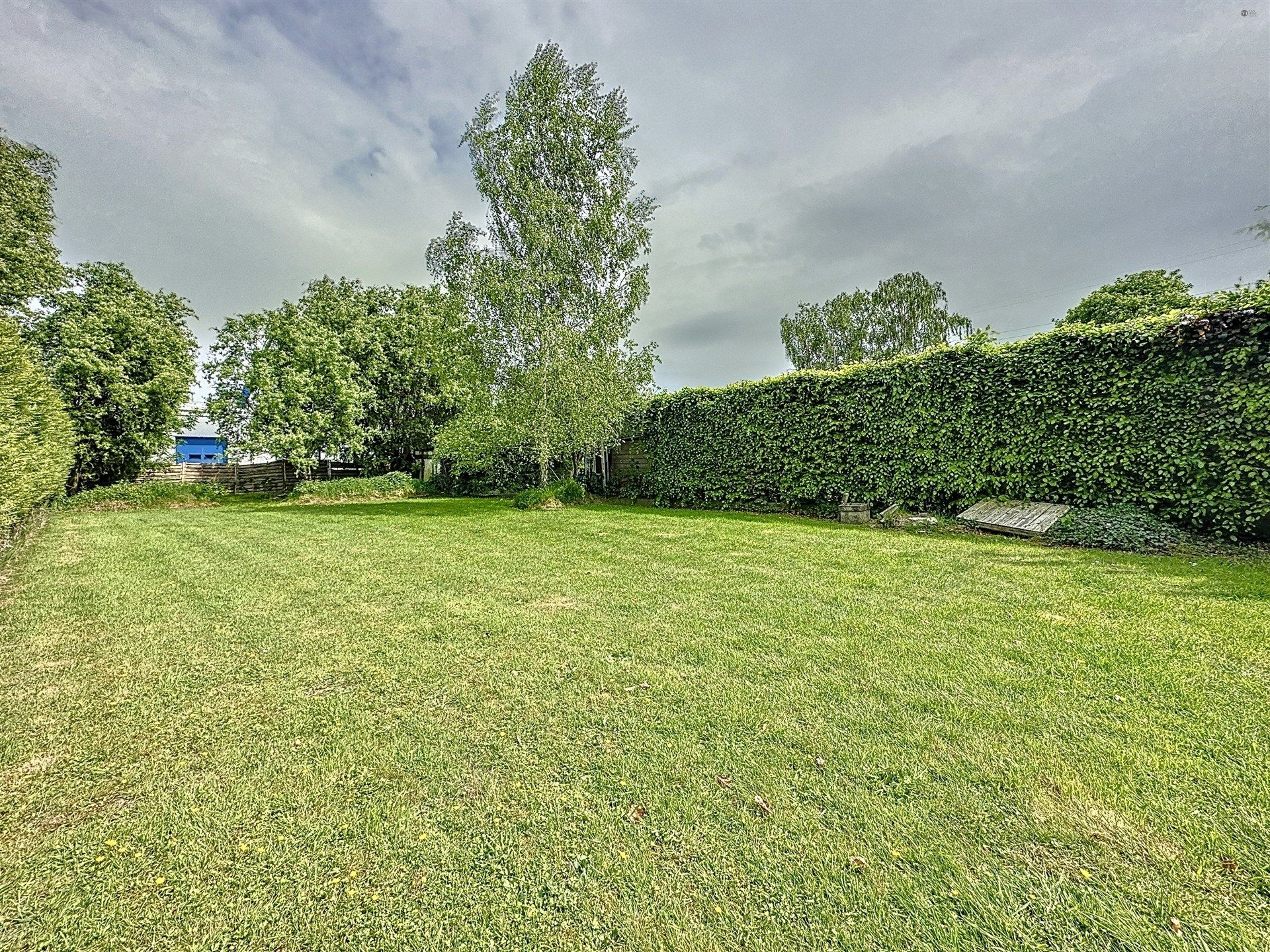 Prachtige gezinswoning met 4 slaapkamers, 2 badkamers op een perceel van 760m²! foto 6