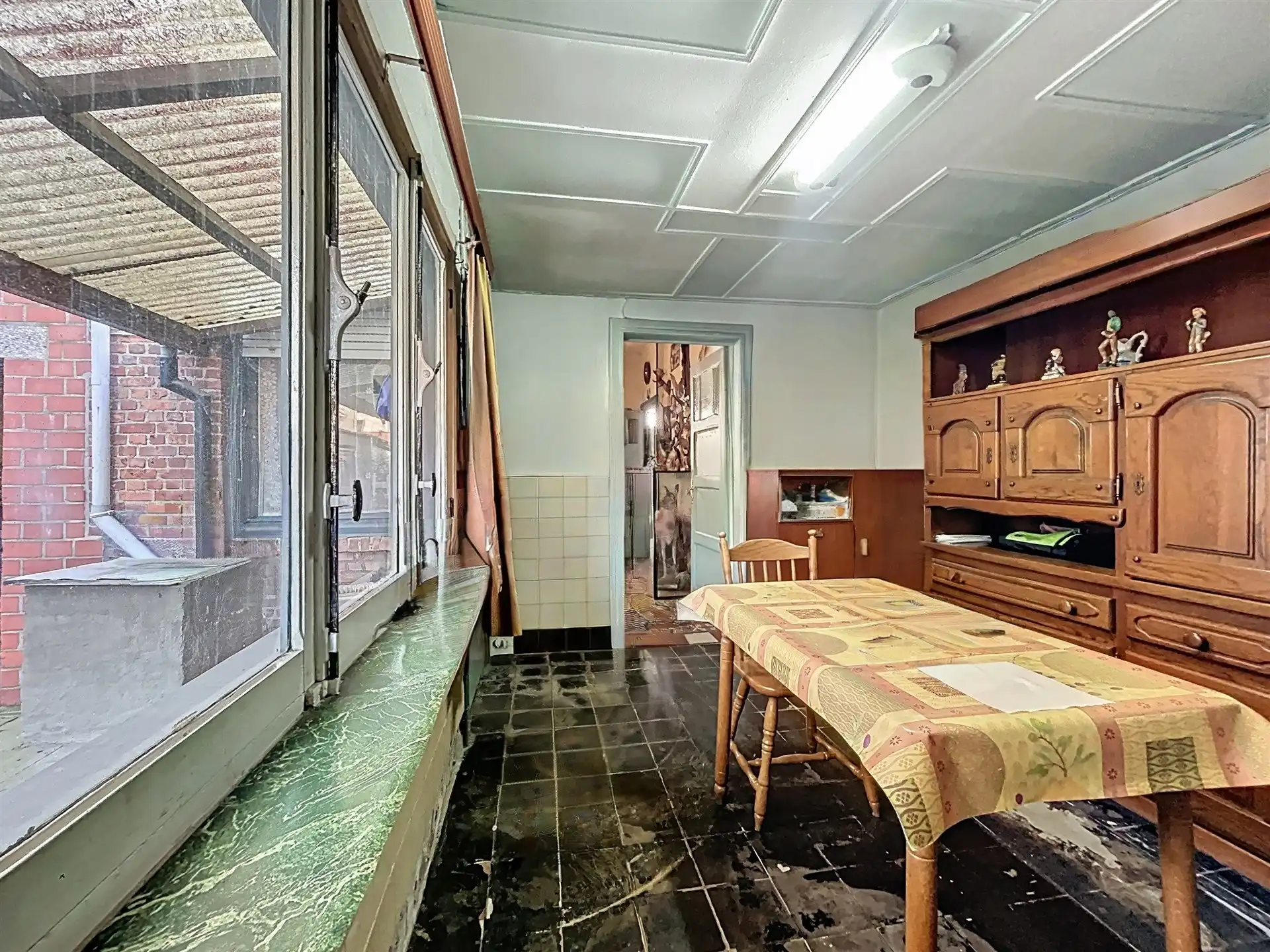  te renoveren woning met garage en tuin in rustige straat. foto 7