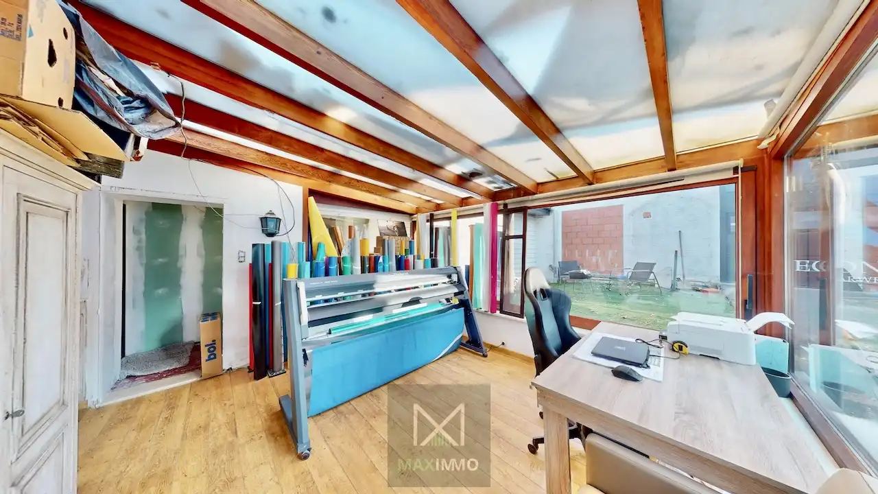 Gelijkvloerse bungalow met loods van 180 m² in het centrum van Marke foto 12