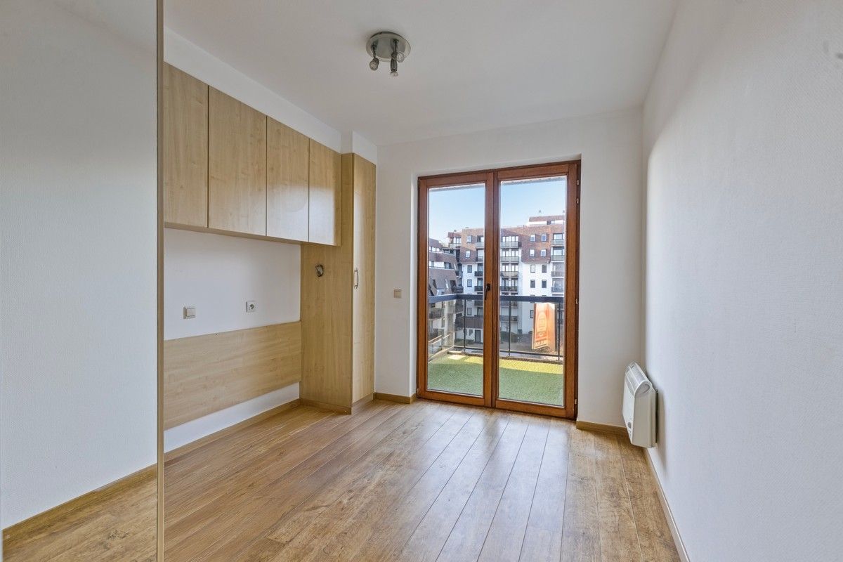Ruim appartement met drie slaapkamers, twee terrassen en parking te koop! foto 12