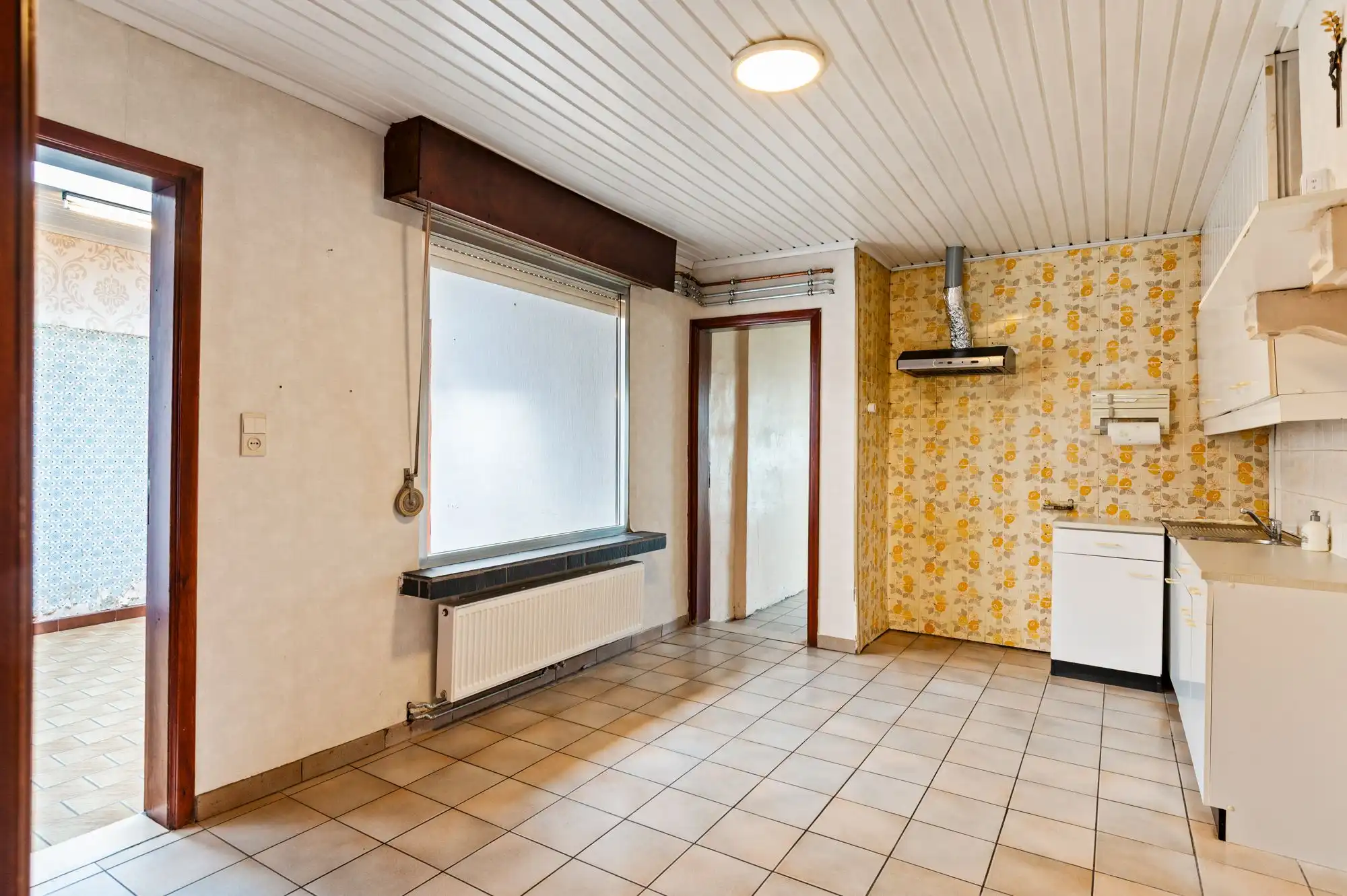 Te renoveren gezinswoning met leuke tuin en 2 garages op topligging in Brasschaat! foto 13