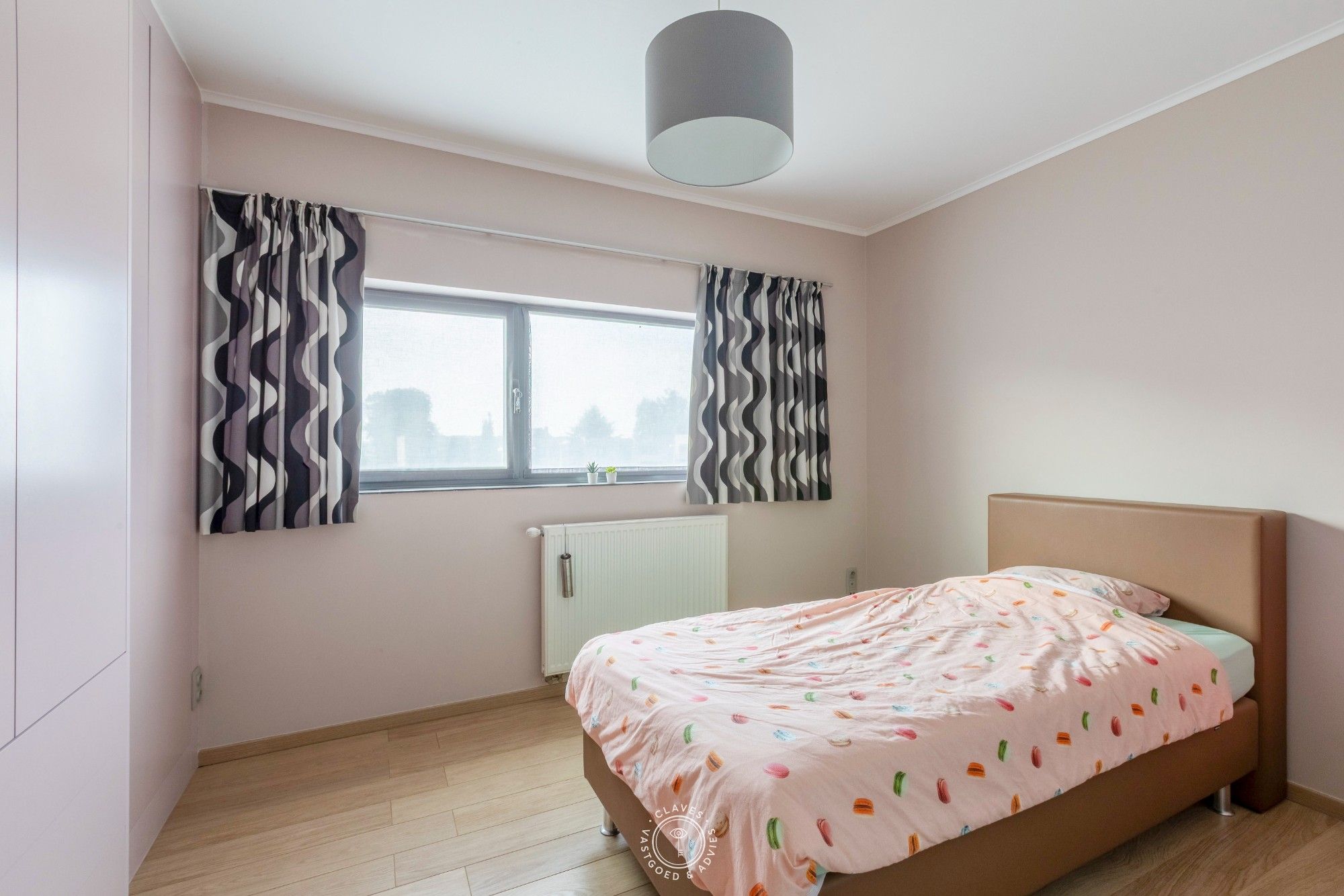 Instapklare woning en ruime tuin in het hart van Vrasene foto 17