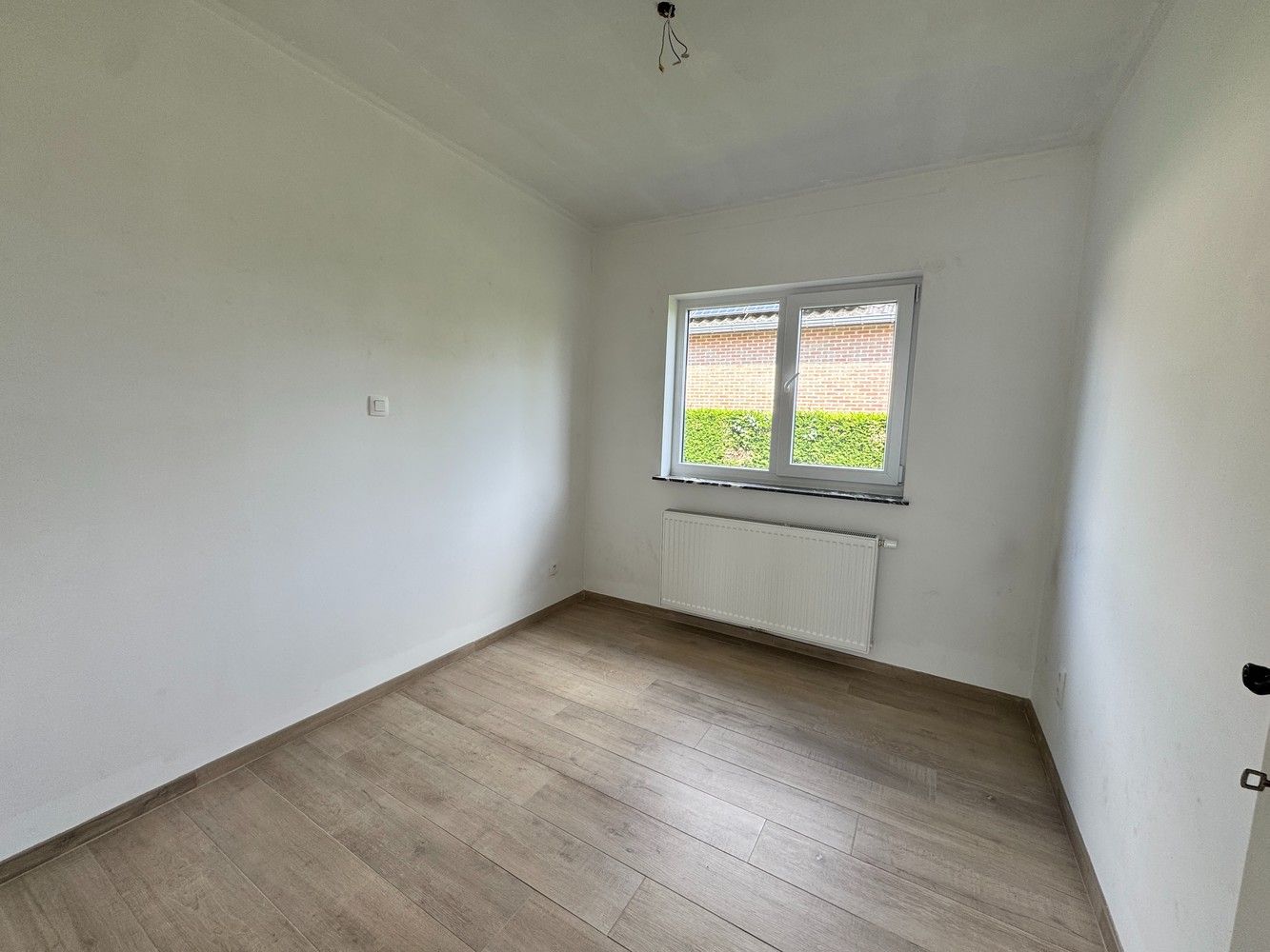 Gelijkvloerse woning met  tuin in het groene Zutendaal foto 7