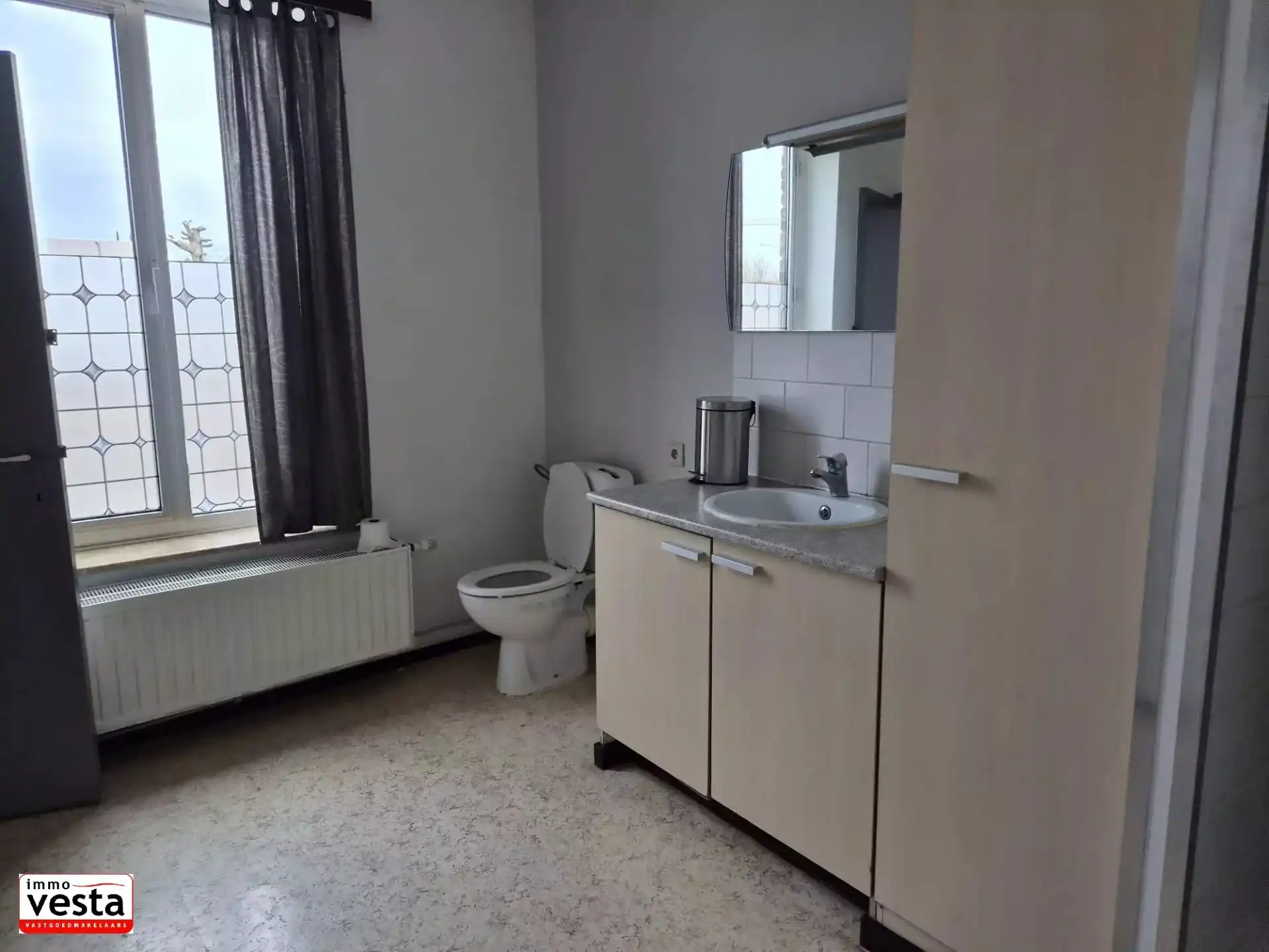 Centraal gelegen rijwoning met 3 slaapkamers foto 9