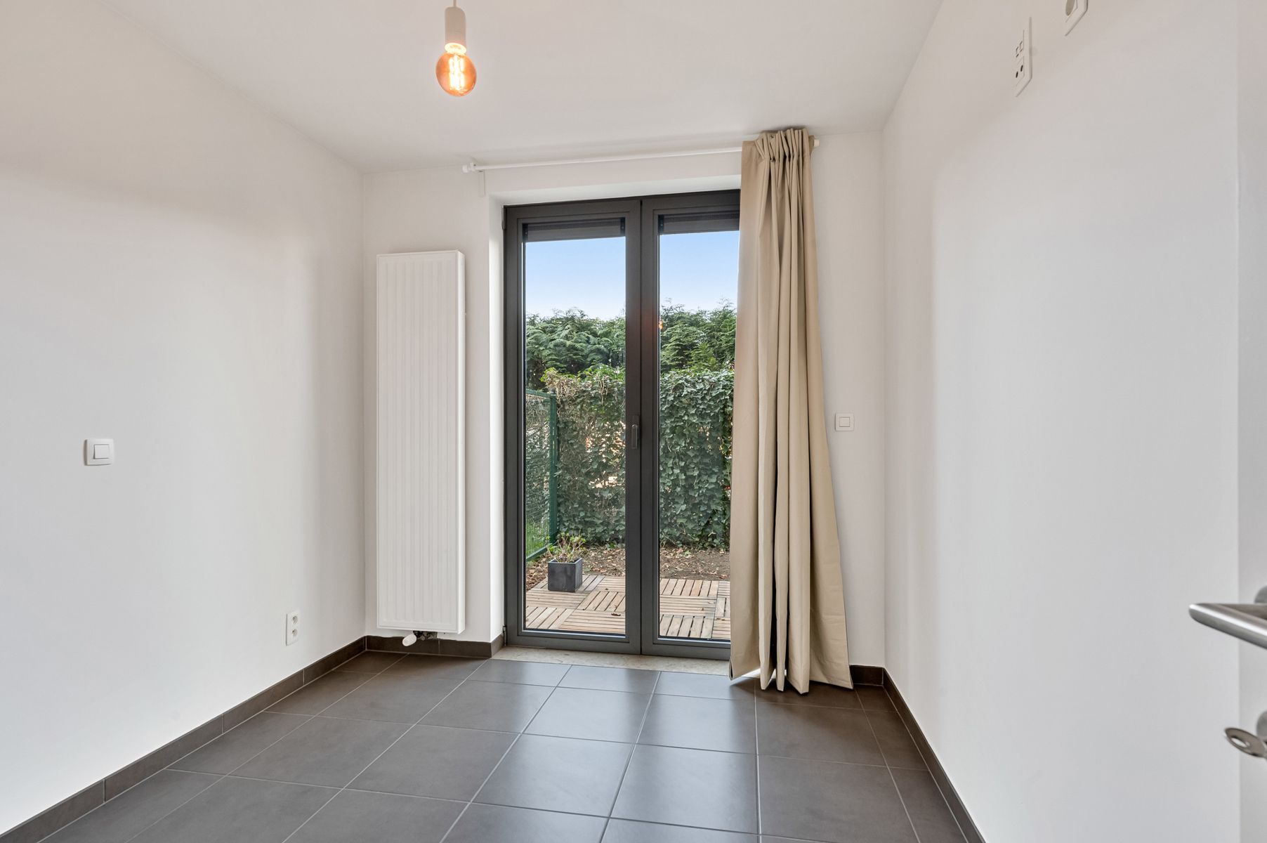 Instapklaar appartement met privé tuin en zonneterras foto 13