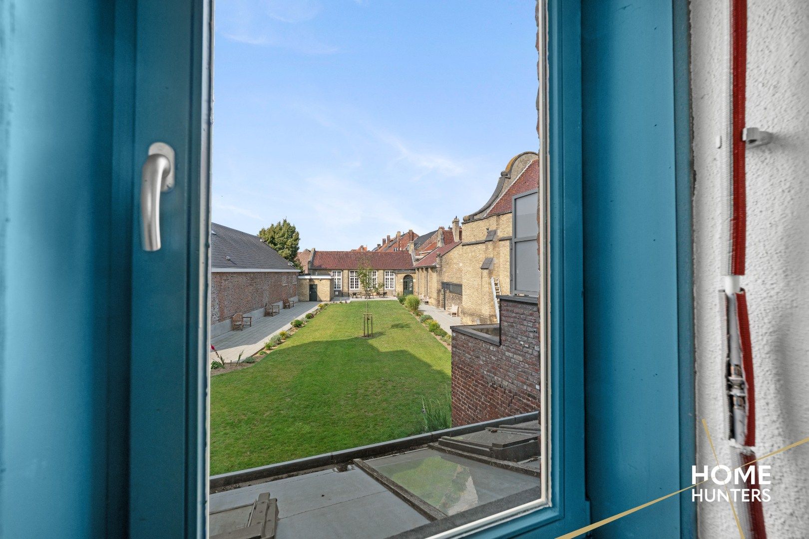 Een verborgen parel in het hart van Ieper – wonen, werken én genieten op één unieke locatie foto 14