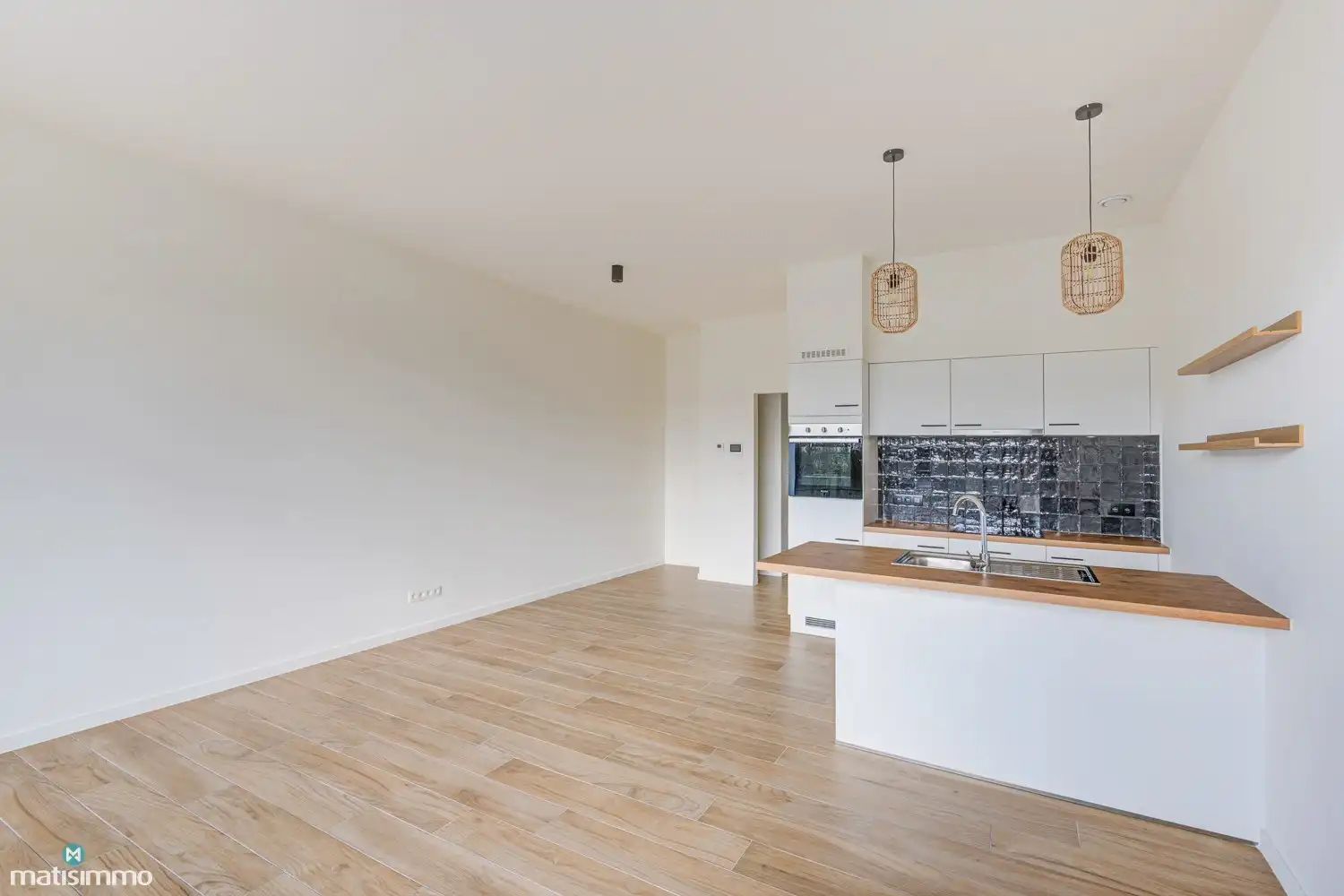 GELIJKSVLOERS APPARTEMENT MET ZUIDGERICHT TERRAS GELEGEN NABIJ HET CENTRUM VAN BILZEN foto 8