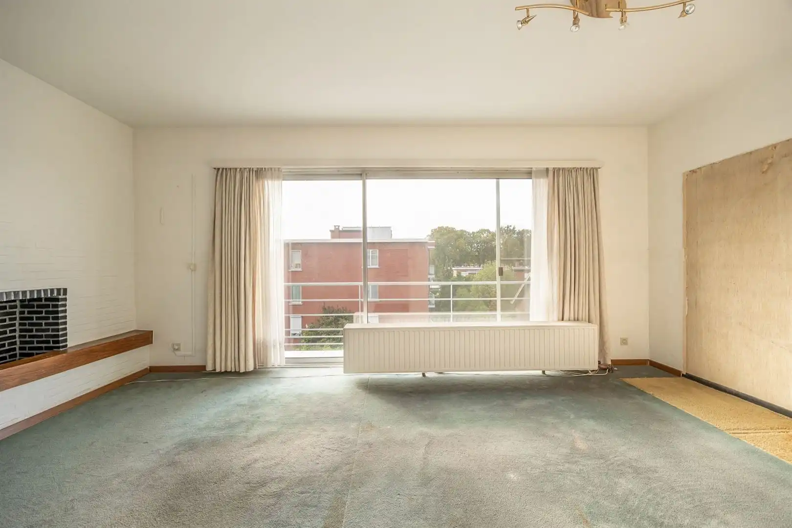Op te frissen 3-slaapkamerappartement met lift en kelderberging  foto 5