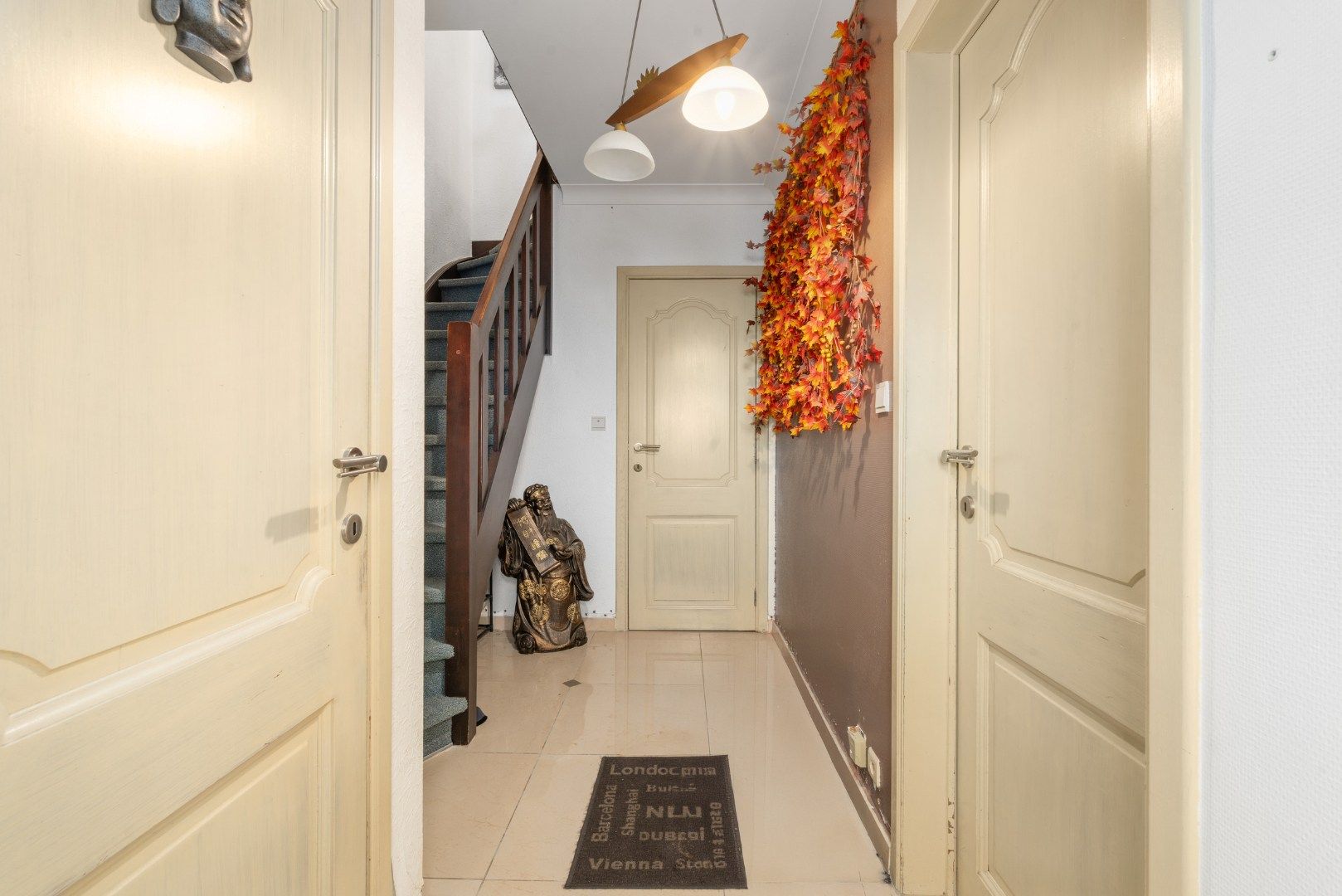 Charmante rijwoning met zonnig terras, wellnessruimte en garagebox in de Vicognewijk foto 11