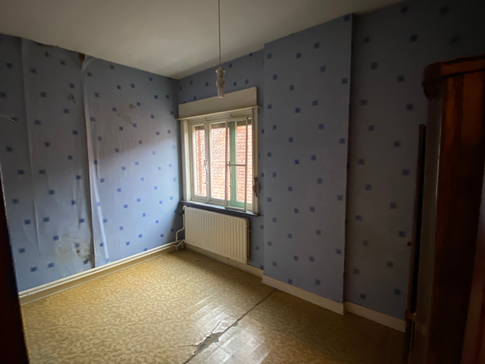 Zeer goed gelegen te renoveren woning foto 11