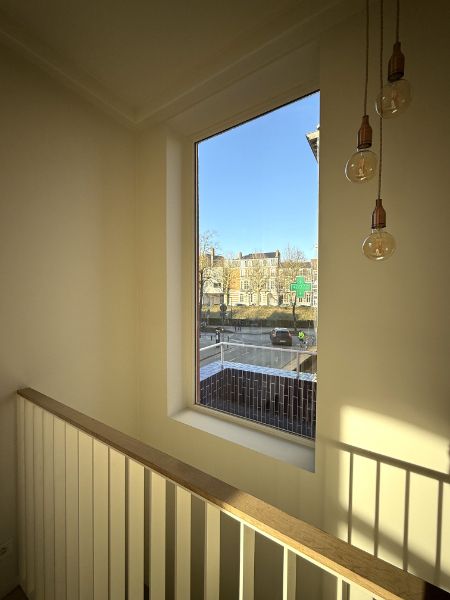 Unieke gerenoveerde triplex appartement met zicht op Coupure foto 8