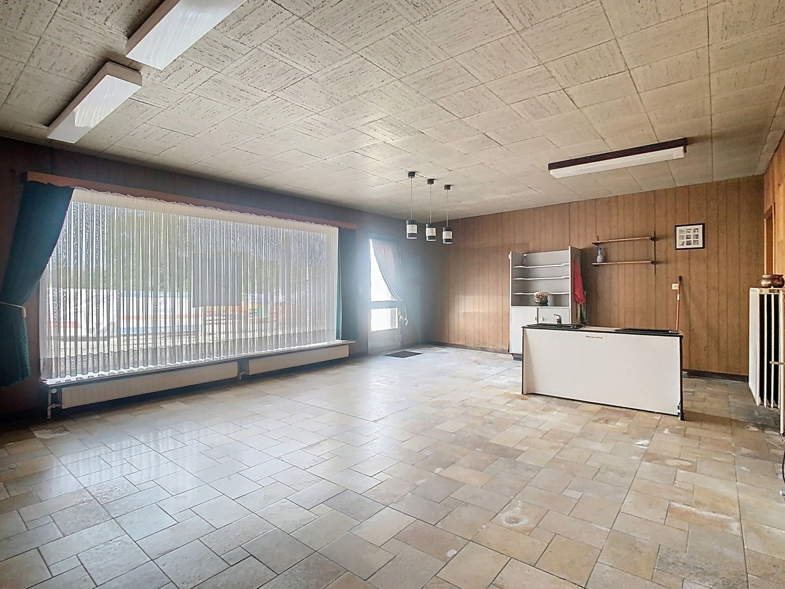 Zéér Ruime Woning met voormalig Handelspand én Tuin! foto 9