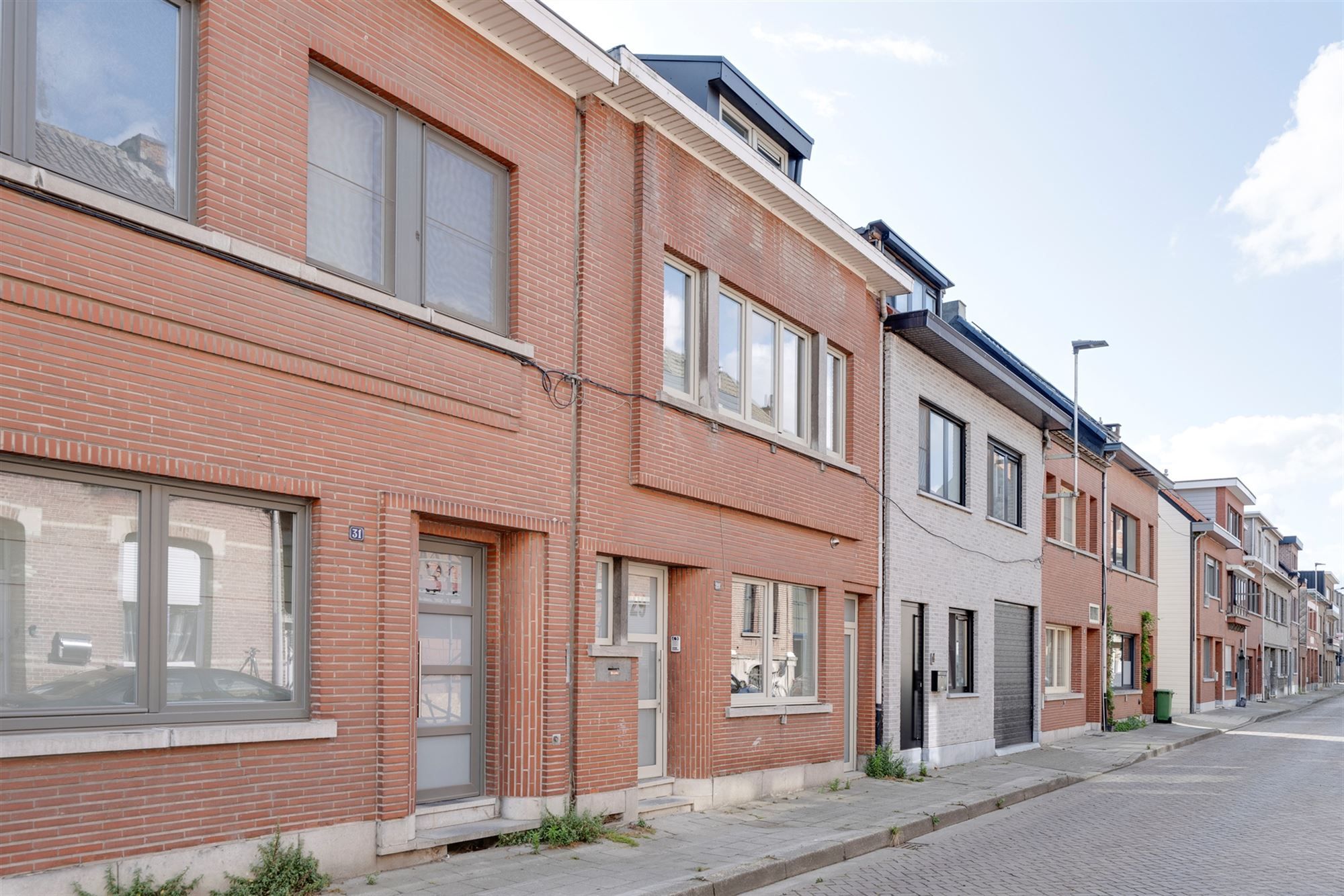 Instapklare eengezinswoning met zonnige tuin omringd door rust foto 2
