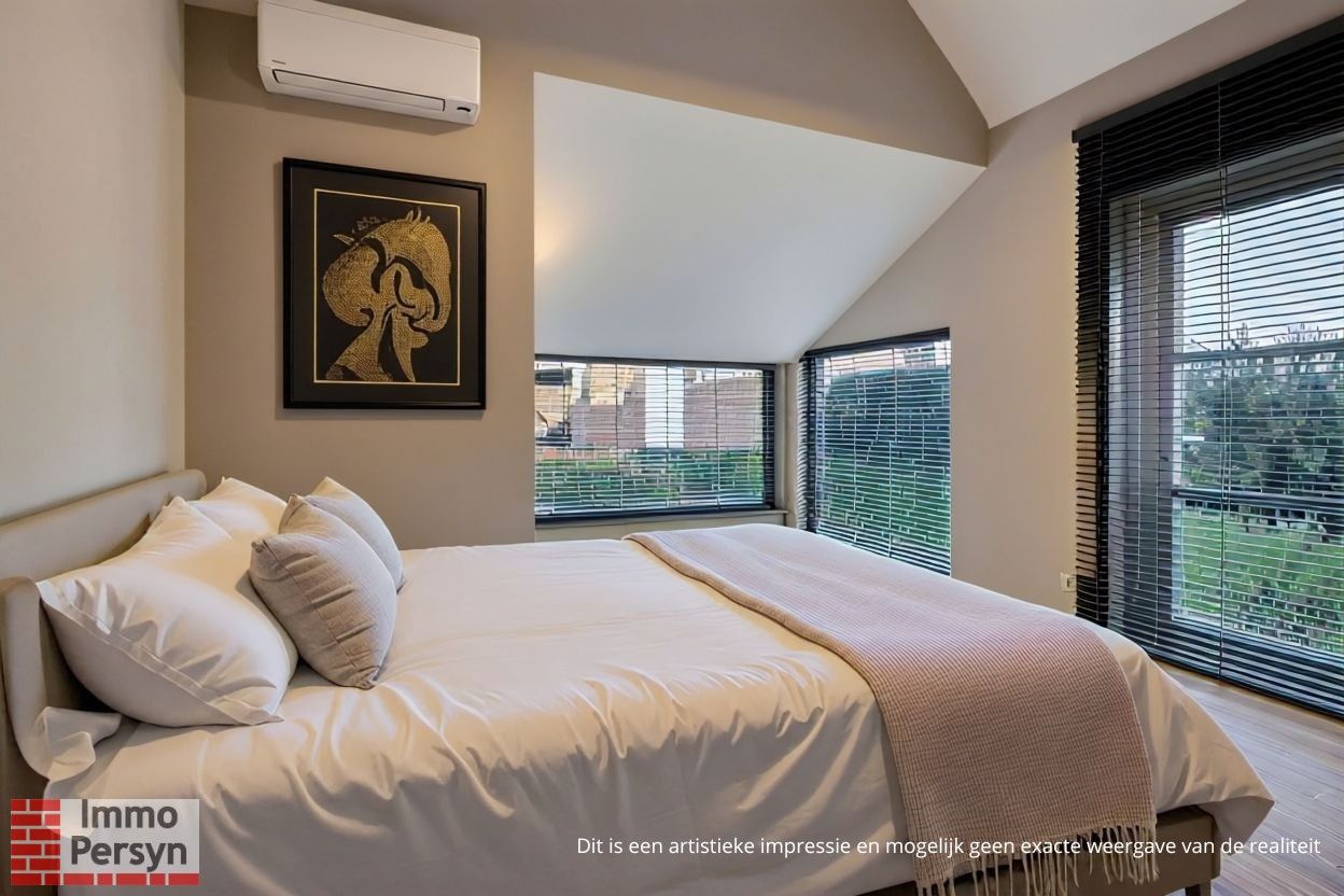 Ruim gelijkvloers appartement met tuin en 2 staanplaatsen. foto 18