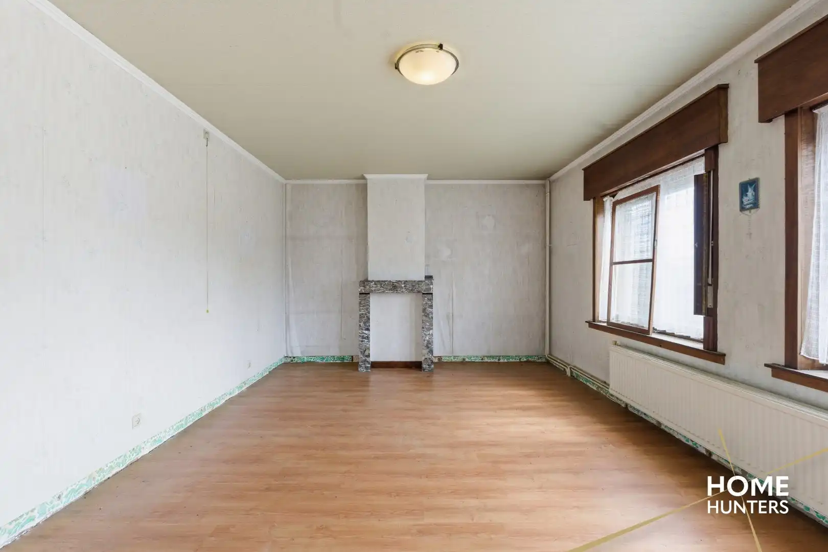 Halfopen te renoveren woning met 4 slaapkamers, ruime tuin en garage op gunstige locatie te Ieper foto 15