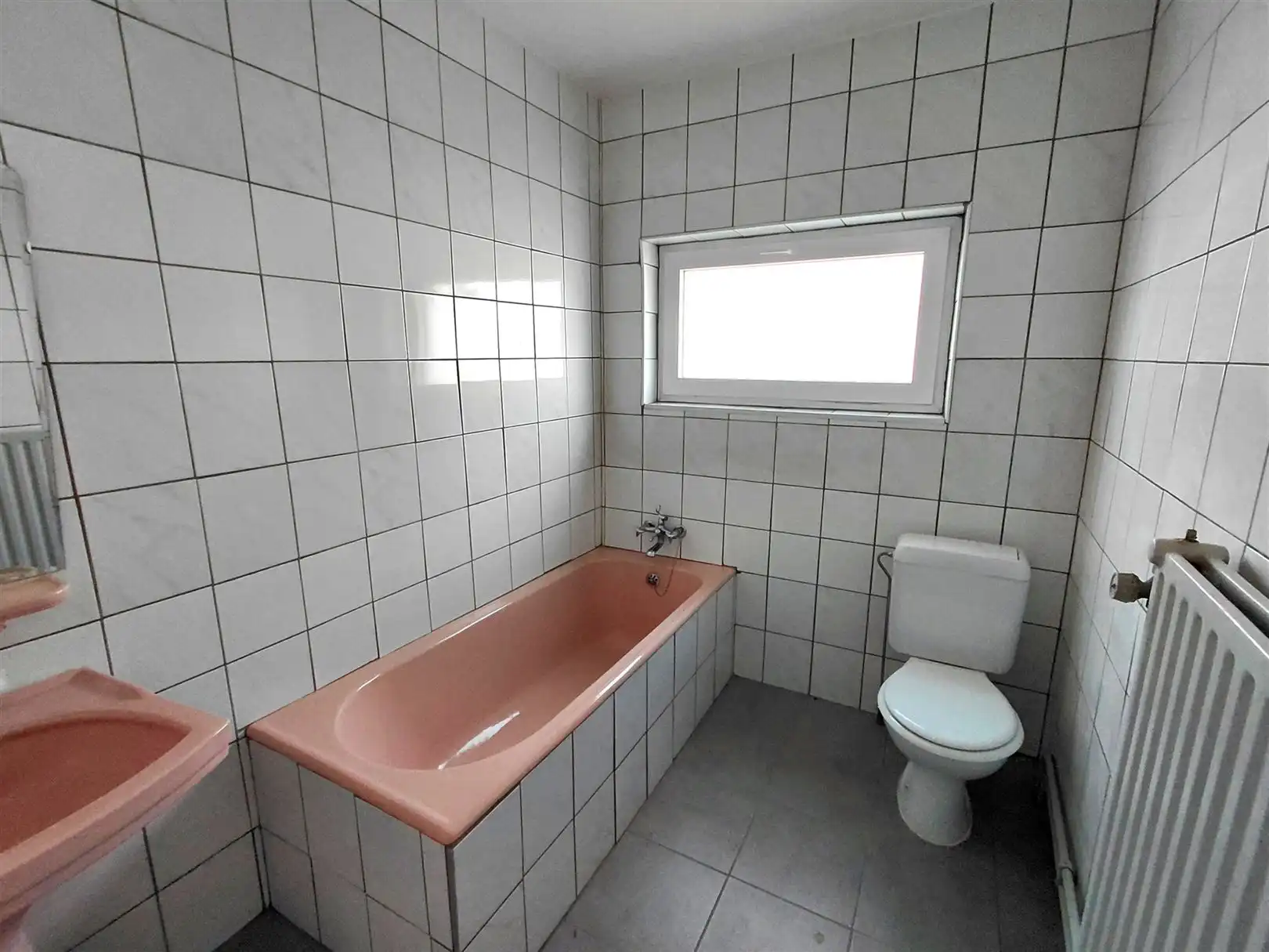 TE HUUR: Gesloten bebouwing met 2 slaapkamers in het centrum van Heusden! foto 19