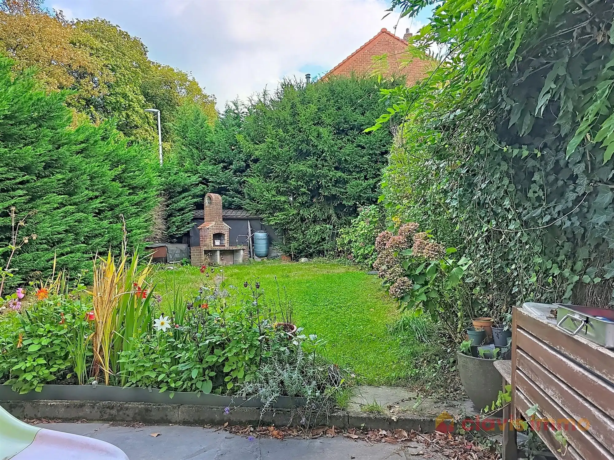 Aangename 3-gevel woning met tuin foto 3