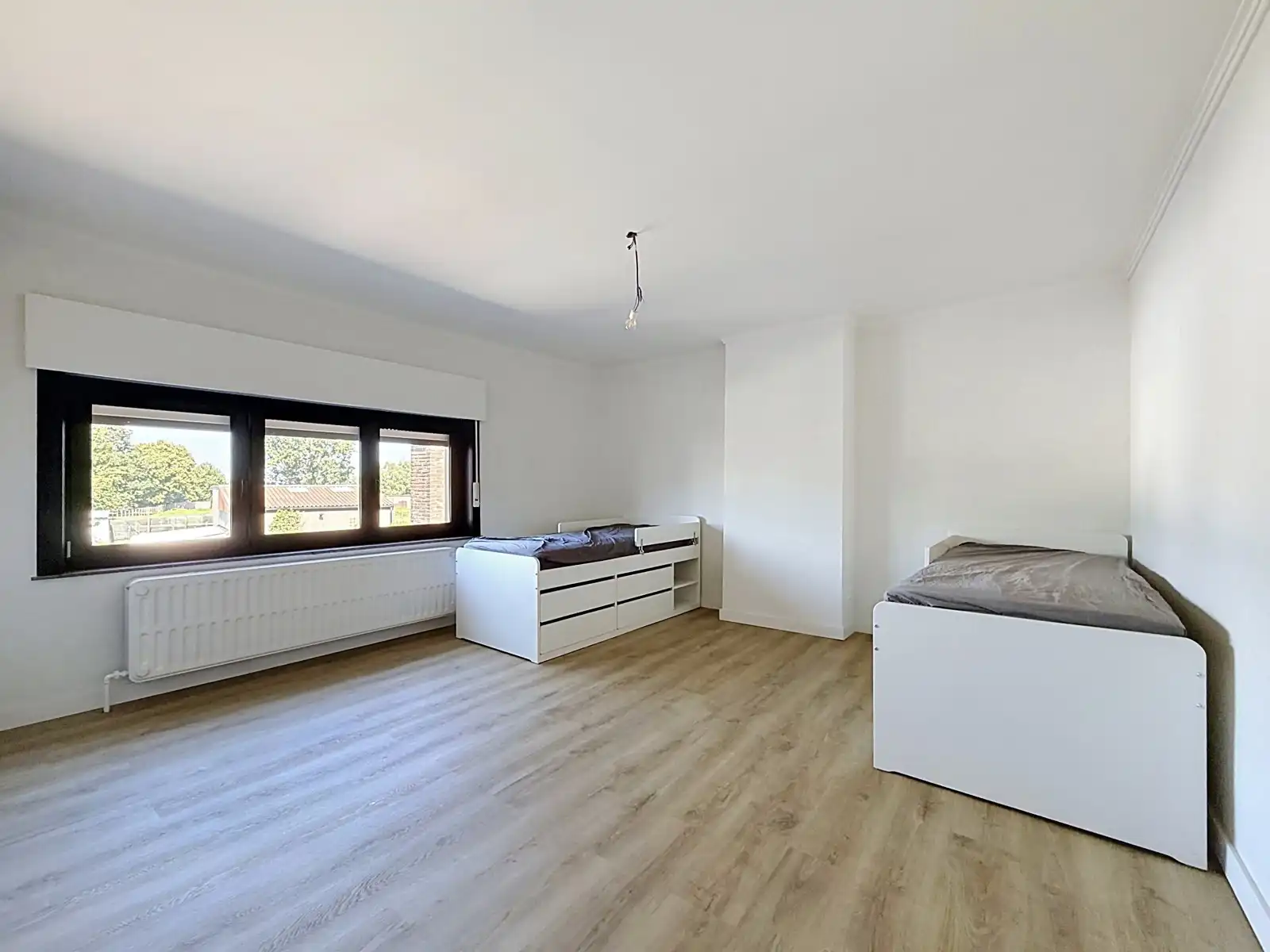 Mooie én instapklare gezinswoning met 3 SLPK én tuin! foto 11