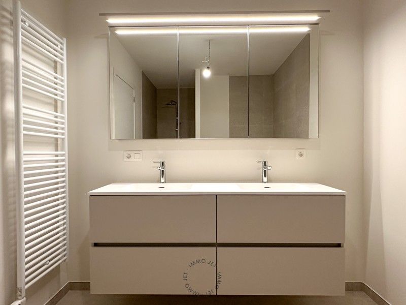 Prachtig gelegen nieuwbouwappartement op het gelijkvloers met twee slaapkamers foto 12