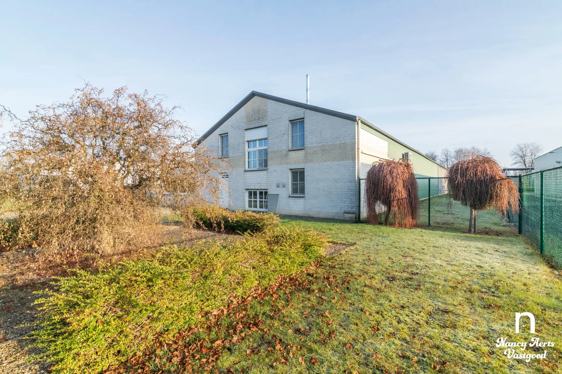 Loods van 550 m² met kantoor en woning met 4 slaapkamers foto 40