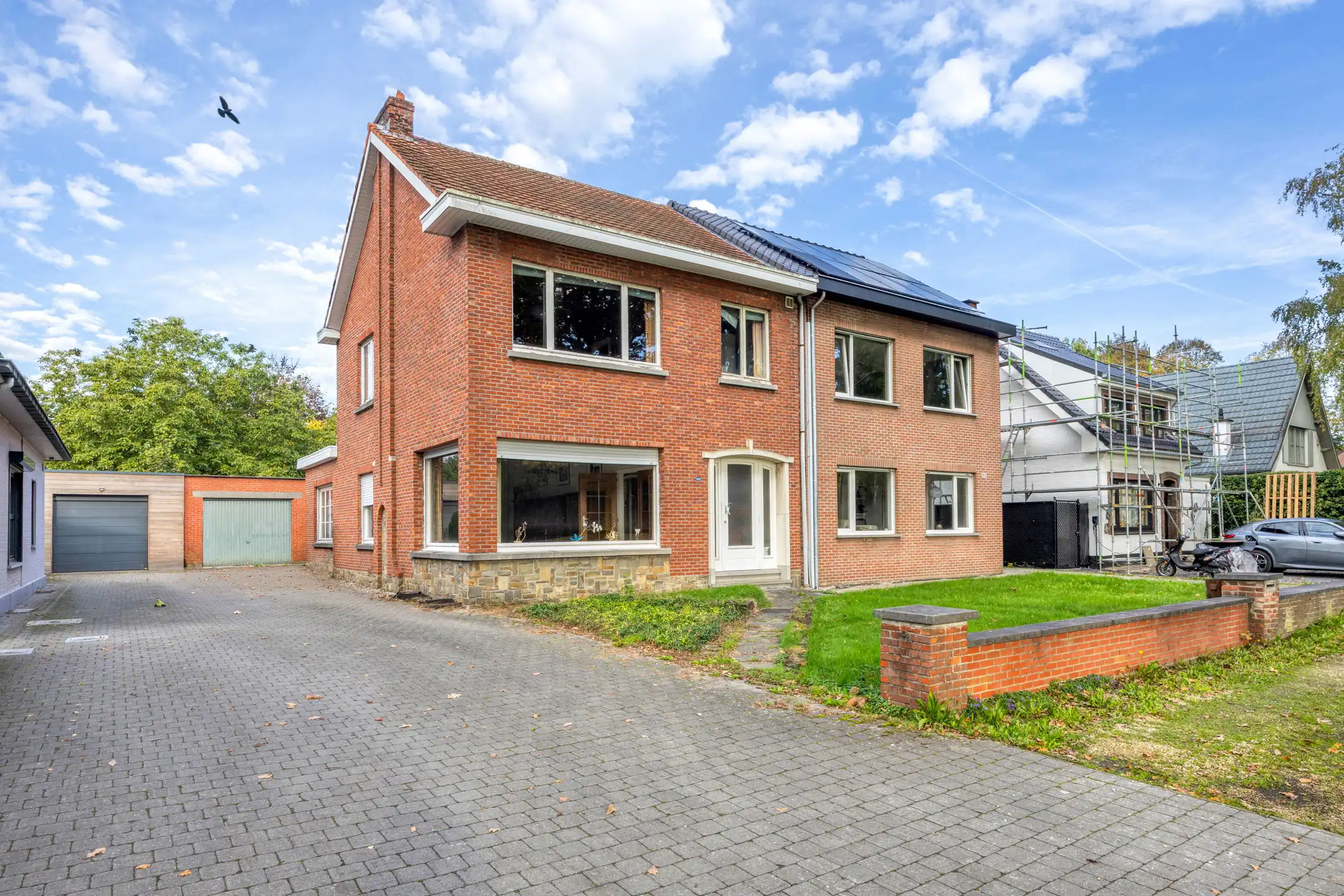 Halfopen woning met renovatiepotentieel te 's-Gravenwezel foto 2