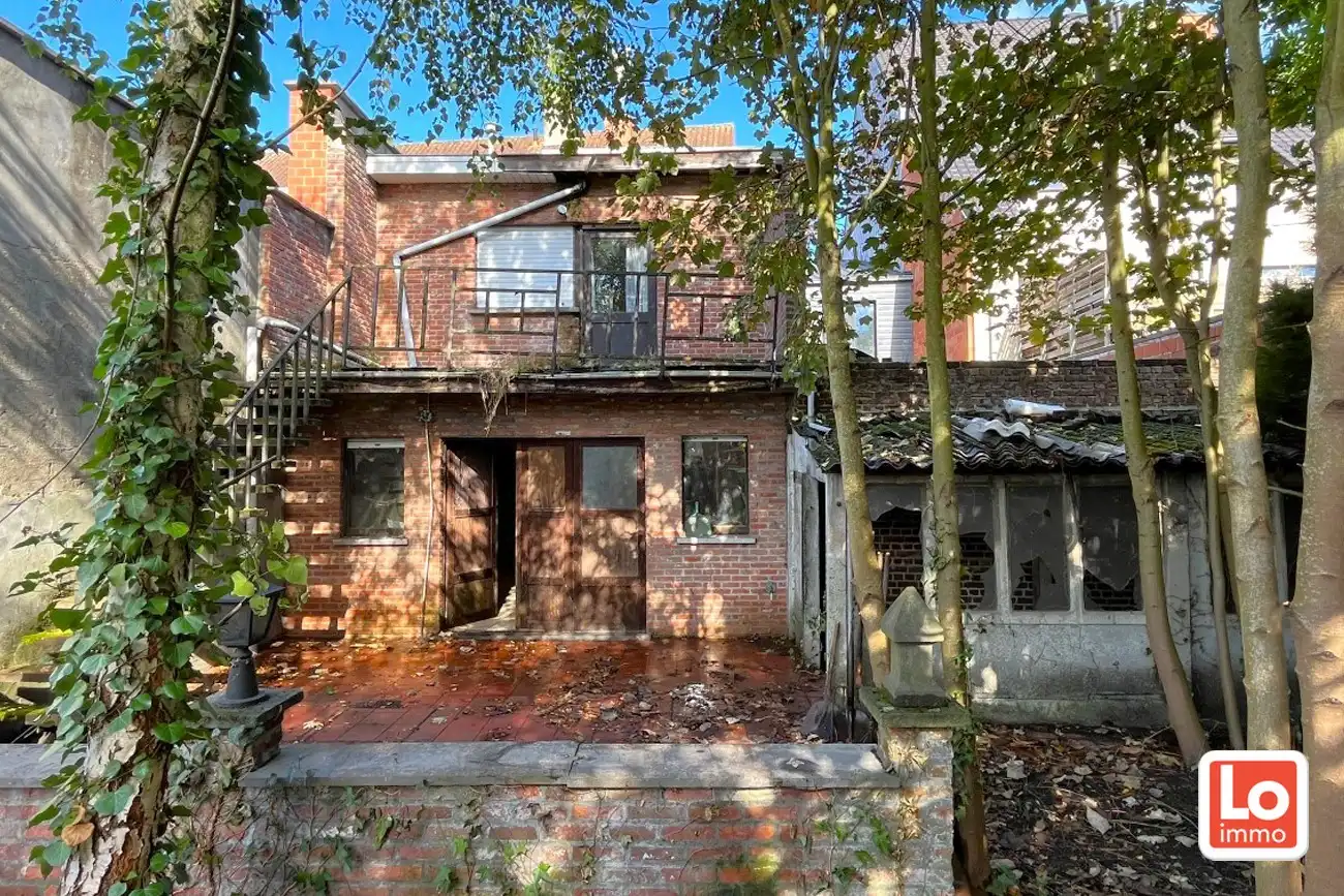 Te renoveren woning met 3 slaapkamer en tuin op een topligging in Centrum Lochristi foto 2