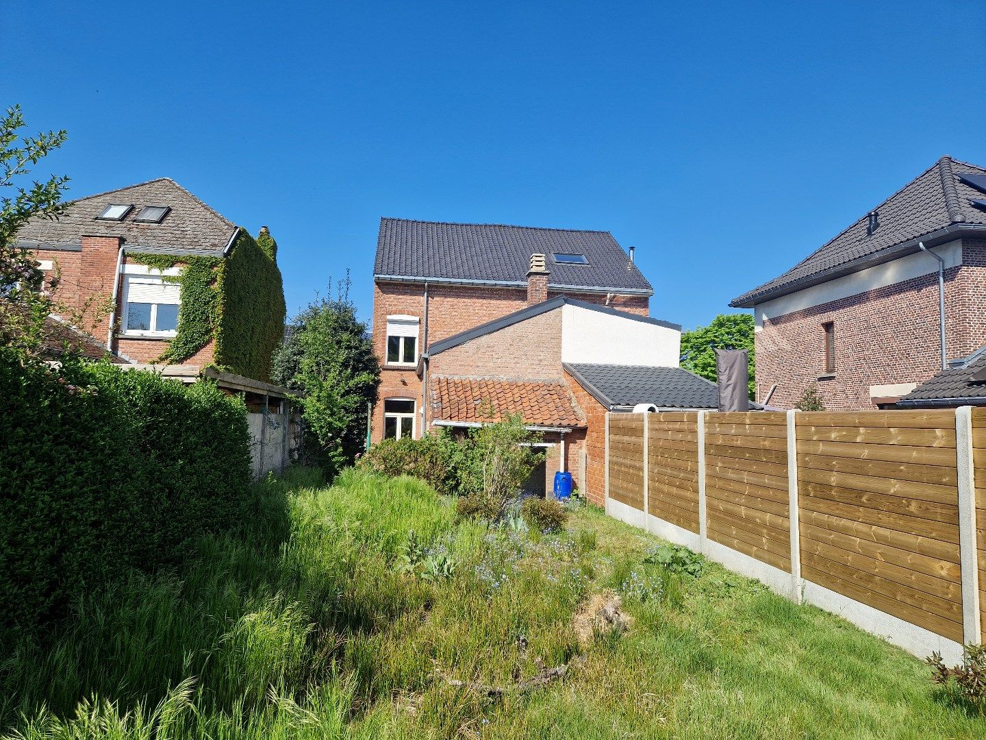 Ruime half open bebouwing met tuin en garage foto 16