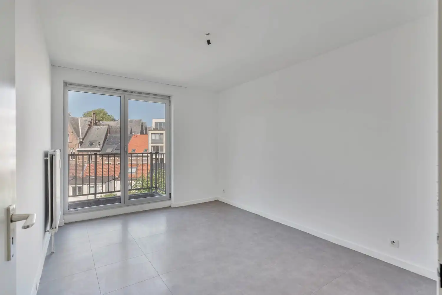Goed gelegen, lichtrijk en energiezuinig appartement met 2 slaapkamers, een terras en een gemeenschappelijke tuin tegenover de botanische tuin en nabij het UZ Gasthuisberg te centrum Leuven! foto 13