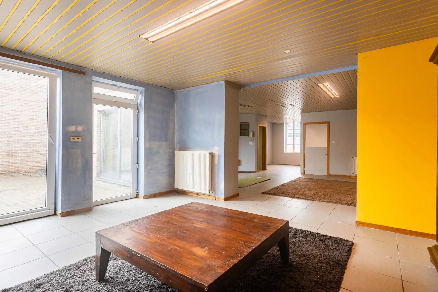 Polyvalente woning met tuin:  momenteel 2 appartementen garage en groot magazijn! foto 9