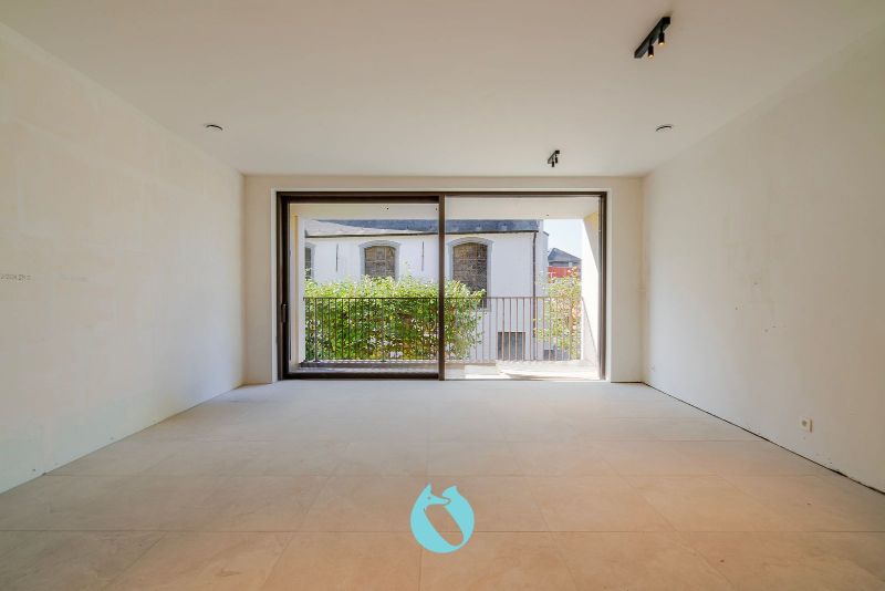 Green Square presenteert u 35 nieuwbouwappartementen en een winkelpand, letterlijk ónder de Kerktoren van Sleidinge. foto 2