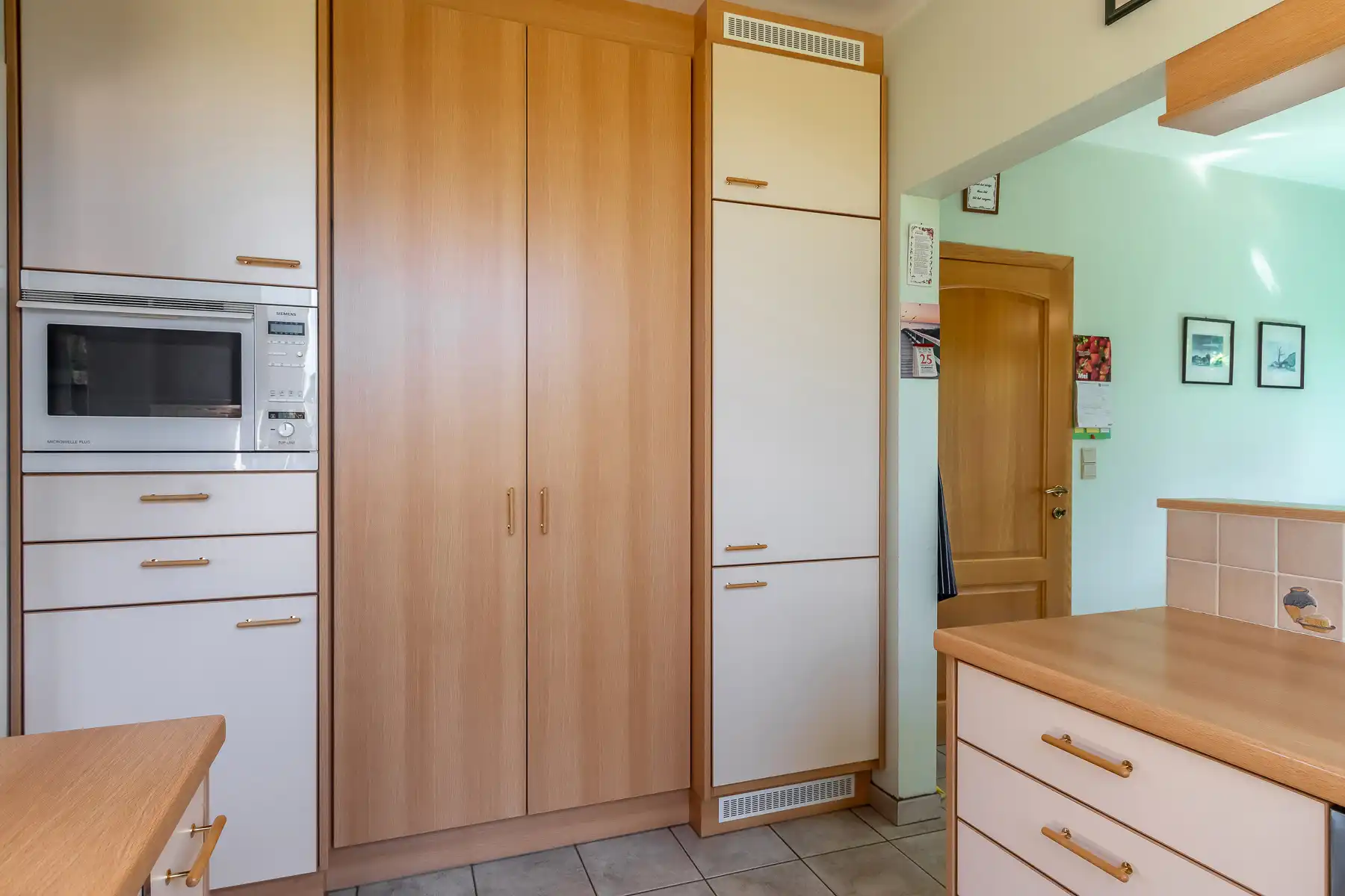 Woning met 3 slaapkamers, inpandige garage en weidse tuin foto 13