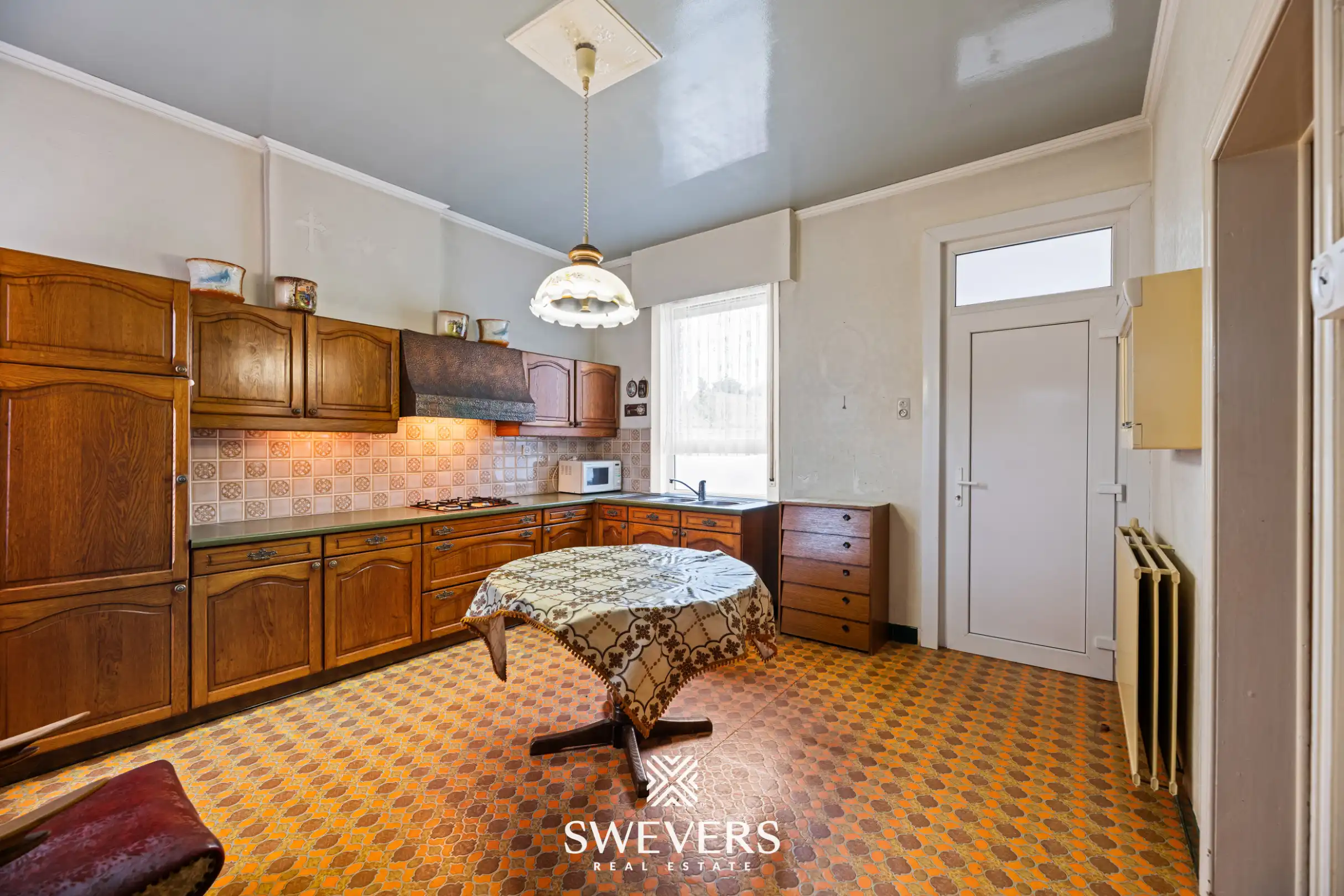 Gezellige halfopen bebouwing toe aan renovatie met mogelijks 3 slaapkamers te Koersel foto 7