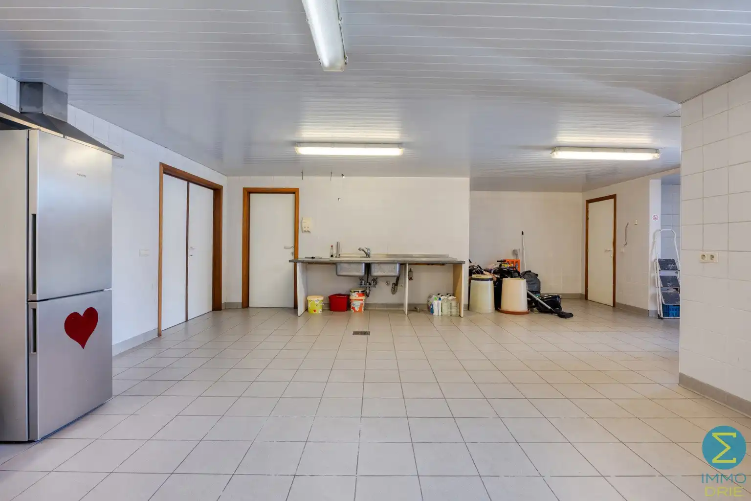 Woning met gelijkvloerse handelsruimte nabij het centrum foto 4