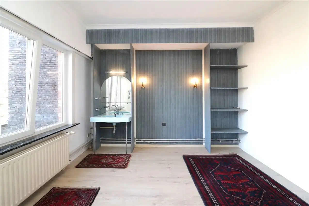 Ruime duplex, twee slaapkamers,  in volle centrum foto 24