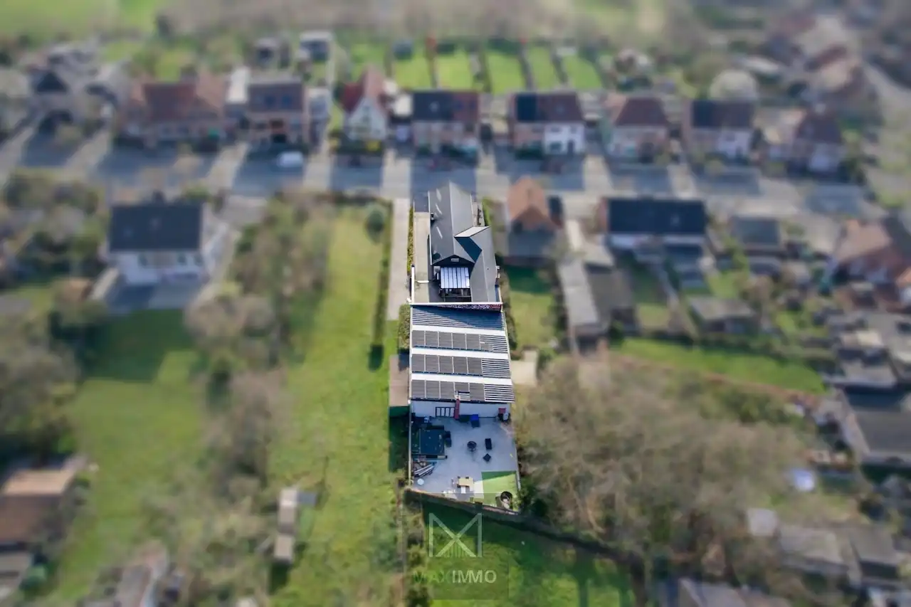 Gelijkvloerse bungalow met loods van 180 m² in het centrum van Marke foto 27