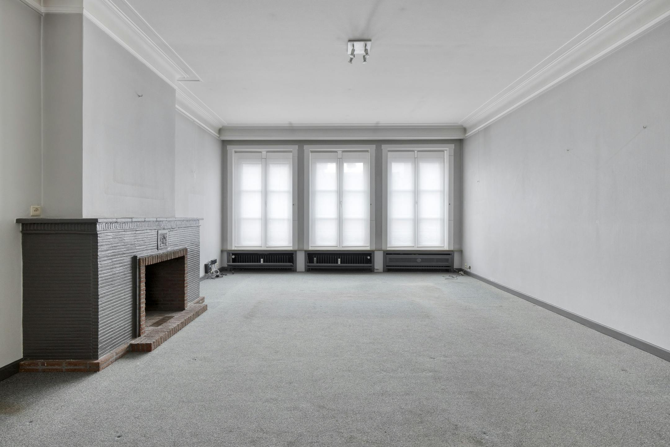 Patrimoniumvennootschap met handelspand en 2 appartementen foto 15