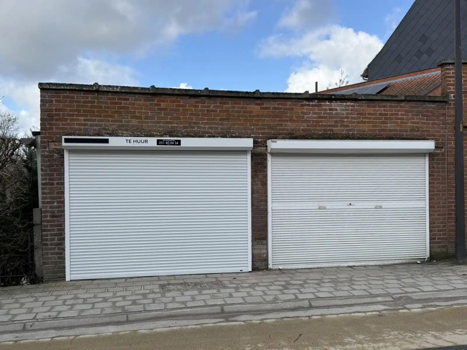 Garage gelegen in het centrum van Tielt, nabij de markt. foto {{pictureIndex}}