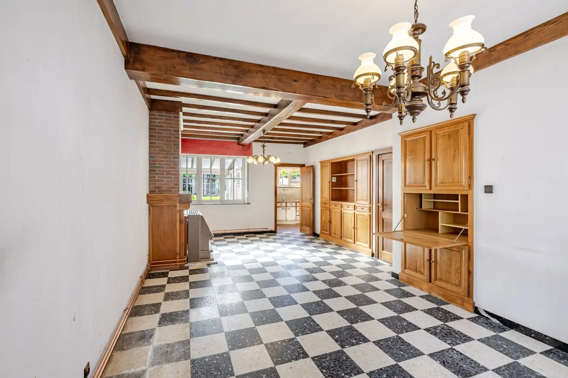 Te renoveren woning met 3 slks en zuidgerichte tuin foto 5