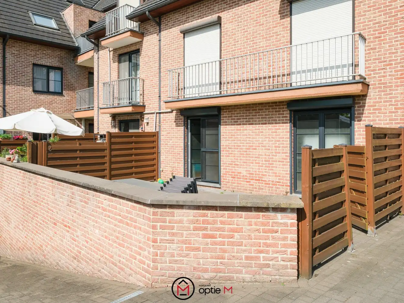 Gelijkvloers appartement te koop in Bilzen – Ruim wonen met terras, carport en kelderberging foto 18