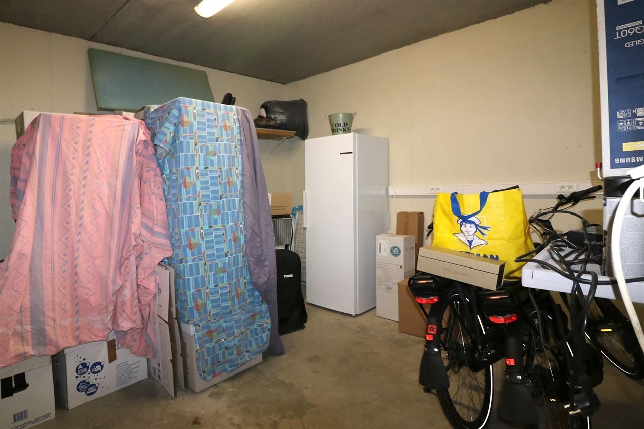 Centraal, doch rustig gelegen duplex met 2 slpk. en afgesloten garage foto 30