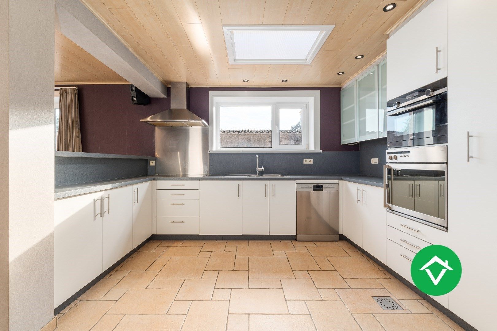 Woning met appartement te koop in het centrum van Eernegem foto 6