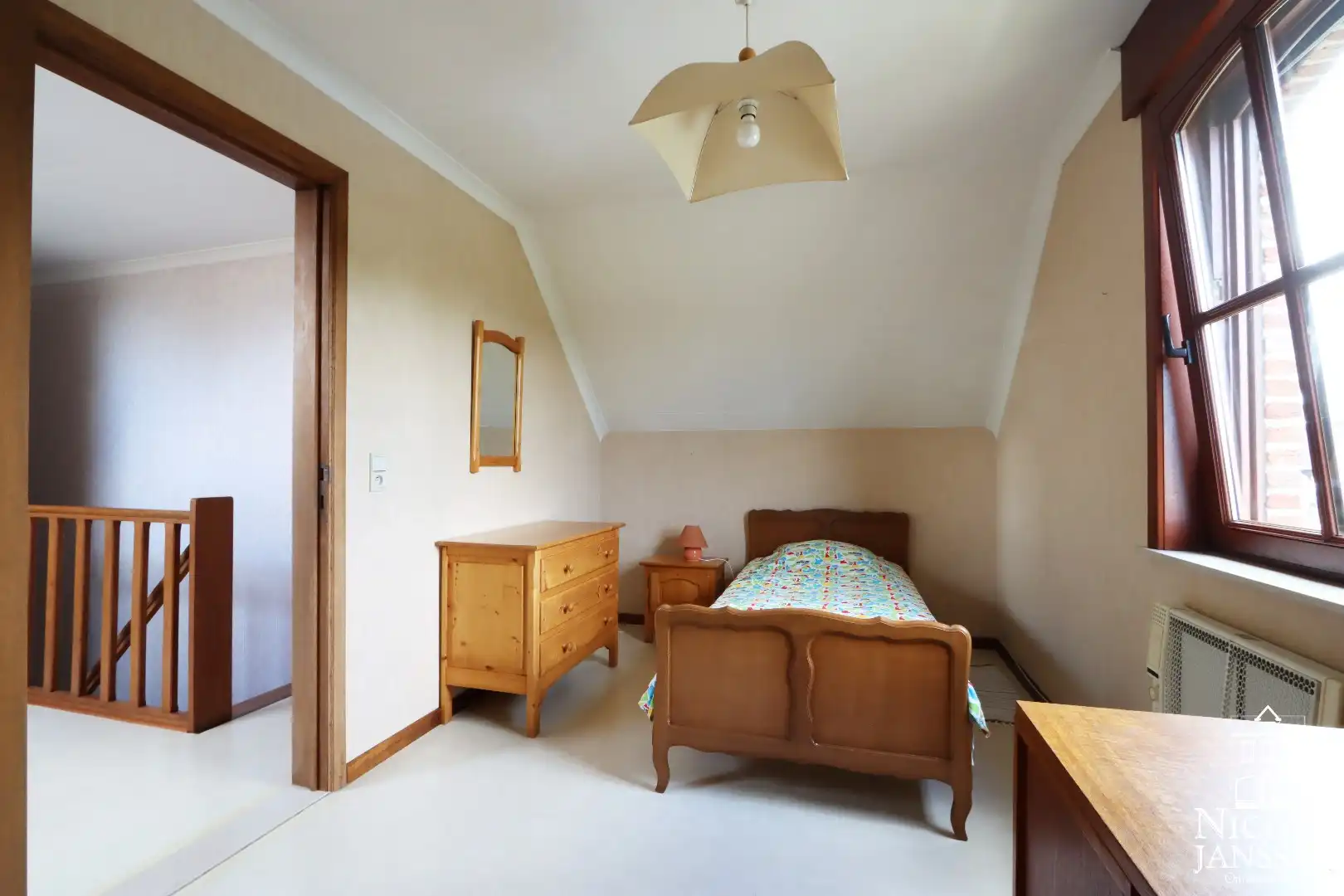 Instapklare en ruime gezinswoning met garage en diepe tuin in het gezellige Beek foto 20