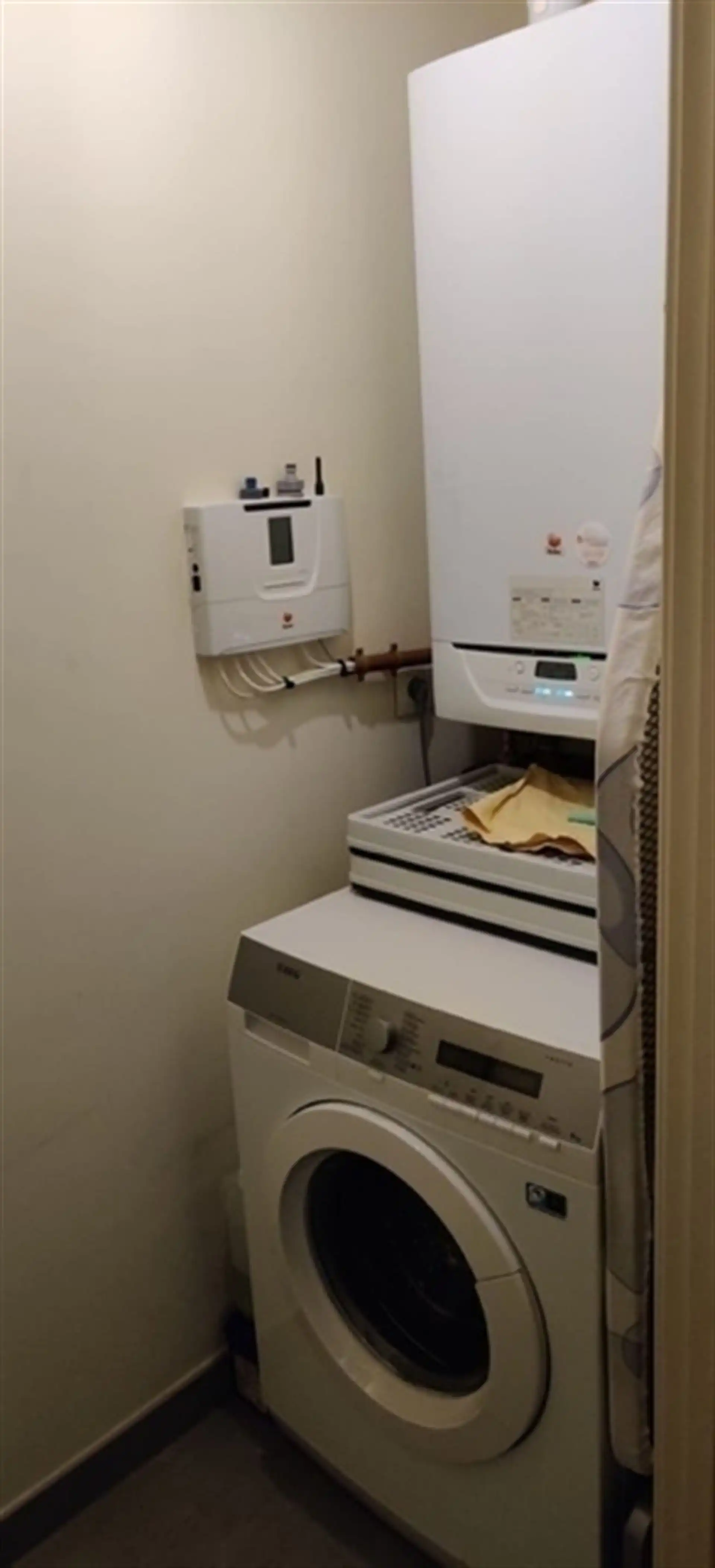 Instapklaar gelijkvloers appartement met zonnige tuin en uniek zicht op het water! foto 11