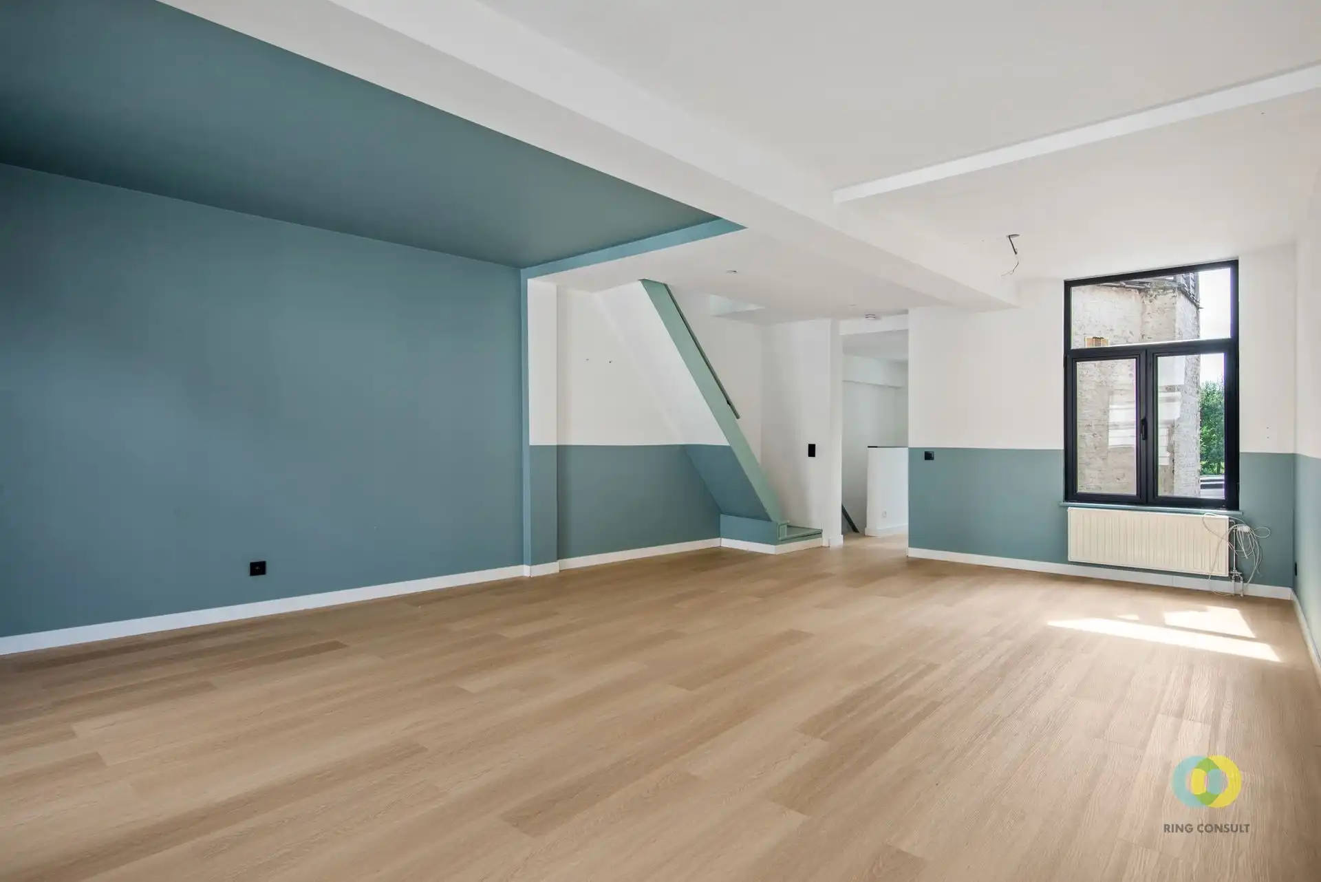 Gebouw met handelsgelijkvloers en duplexappartement foto 10