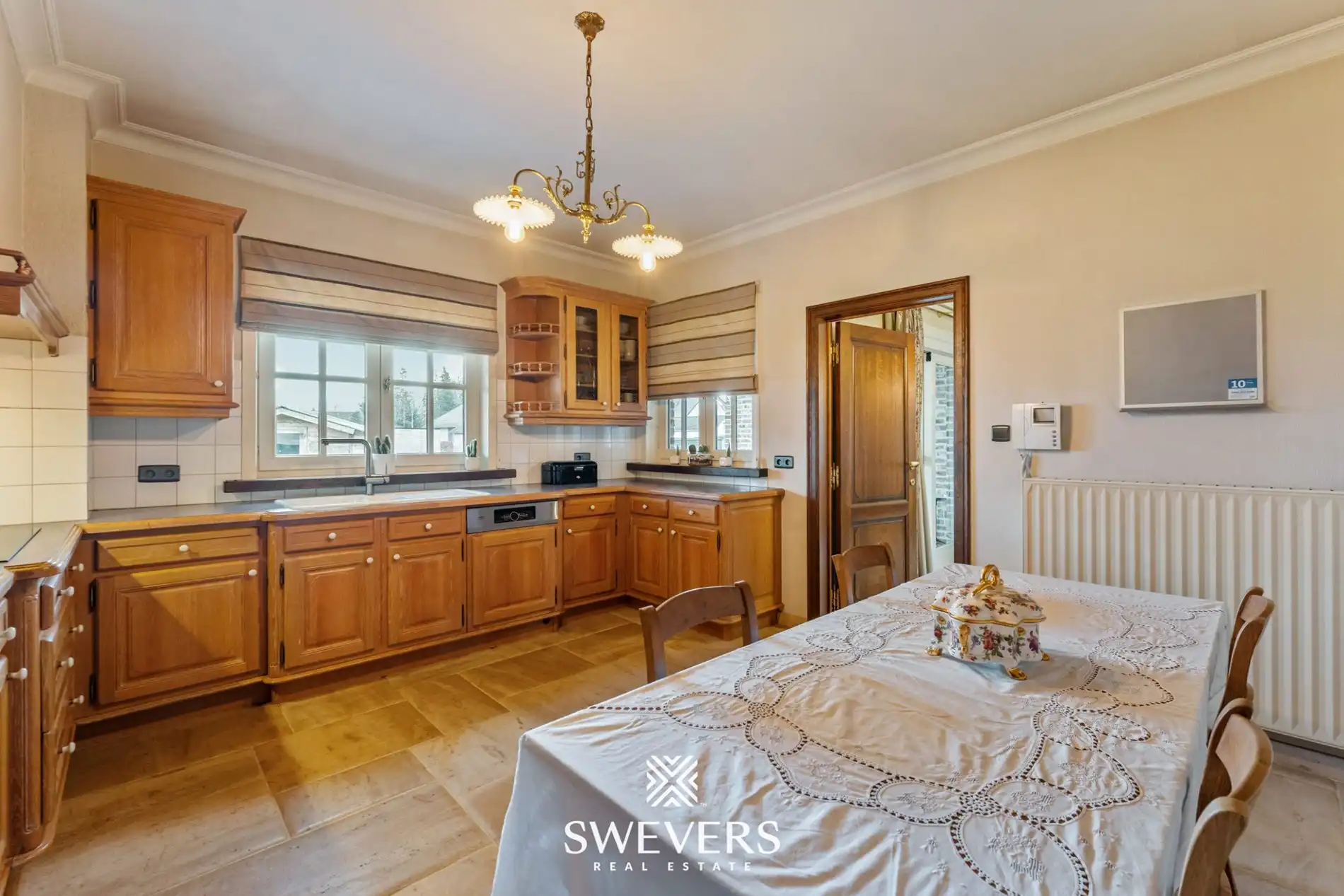 Ruime open bebouwing met 4 slaapkamers en zonnige tuin in Houthalen foto 12