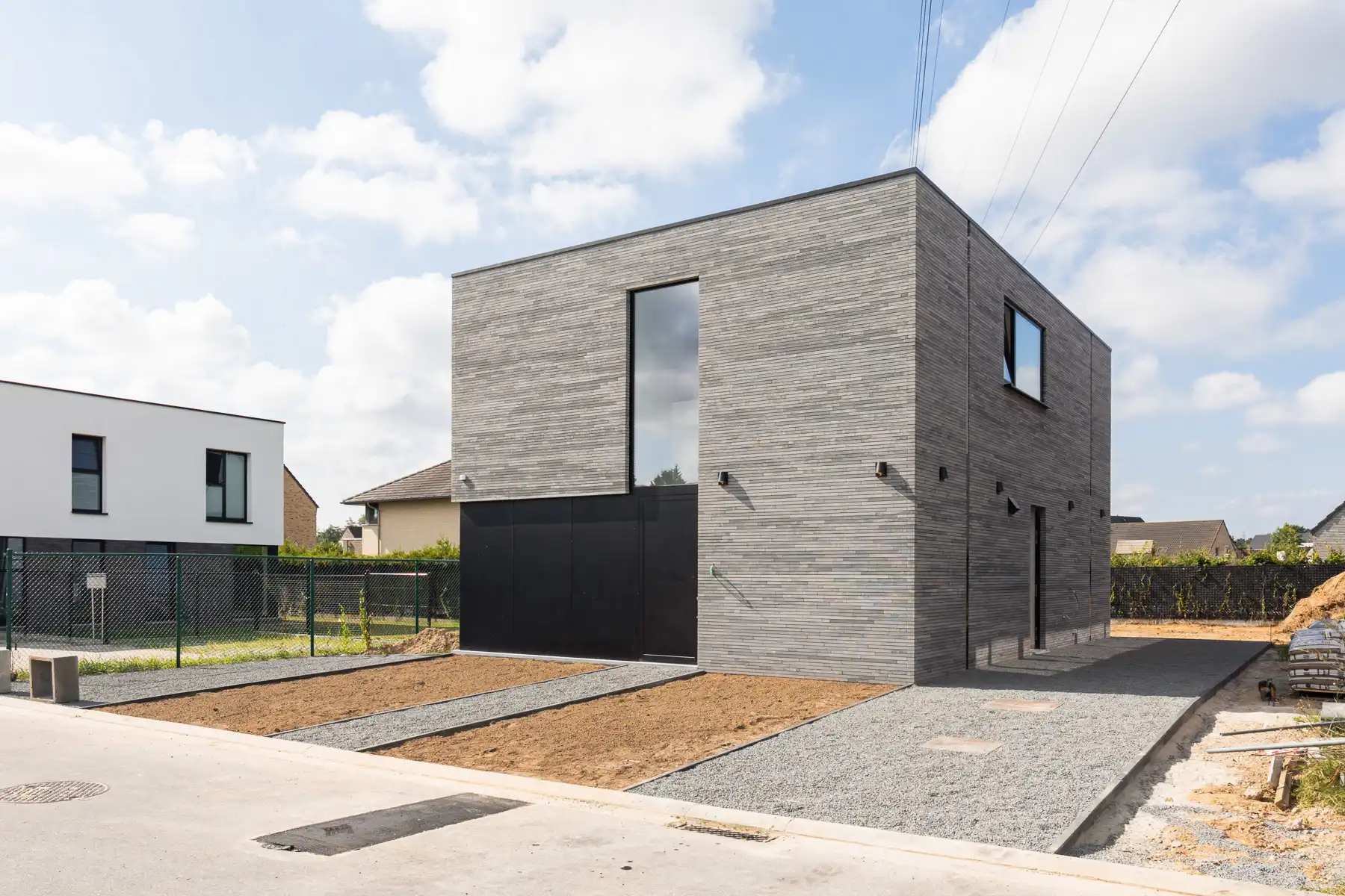 Knappe nieuwbouw villa in gezinsvriendelijke buurt foto {{pictureIndex}}