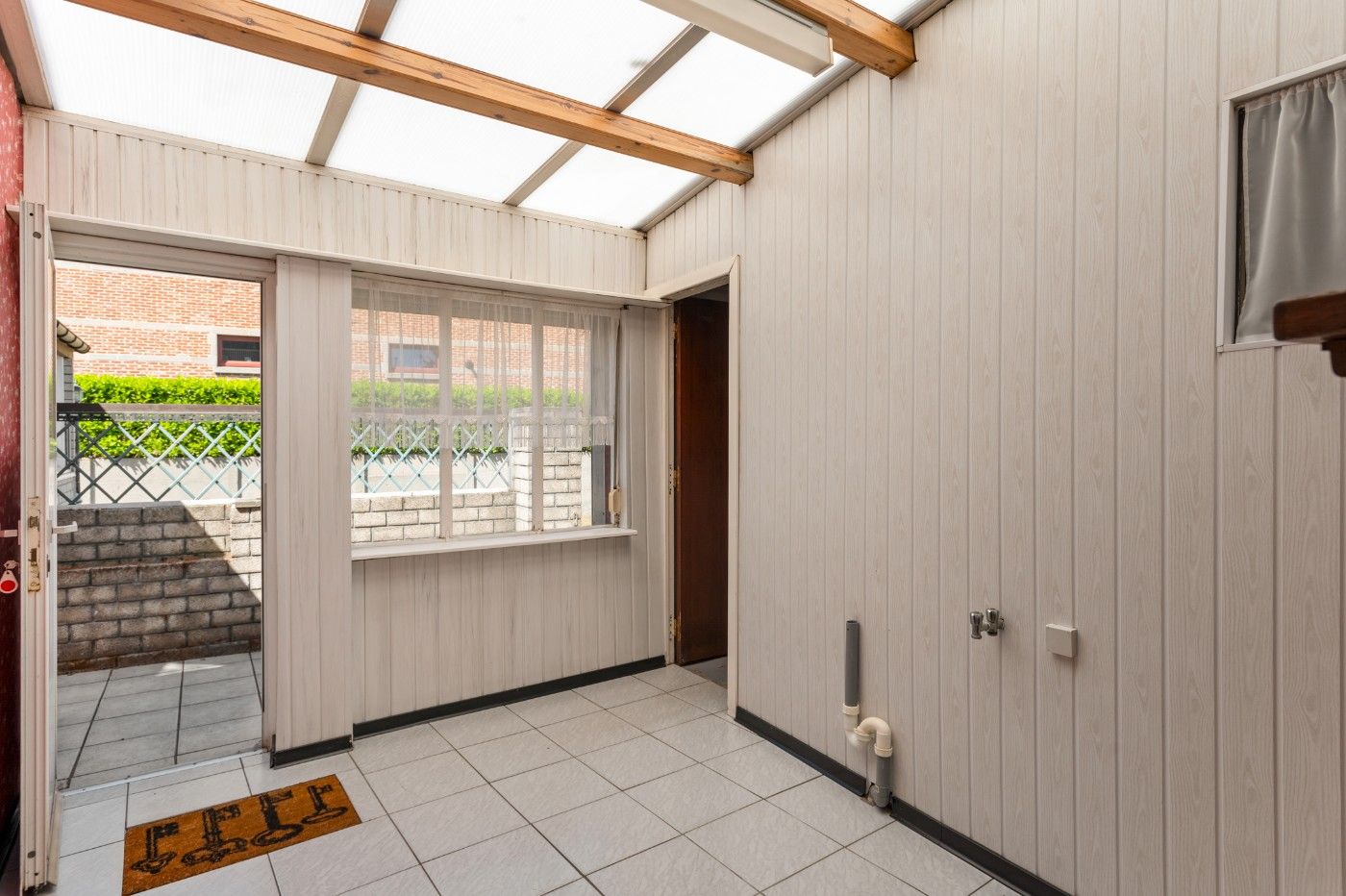 Tof gelegen, te renoveren woning met 2 slpk., garage en tuin foto 7