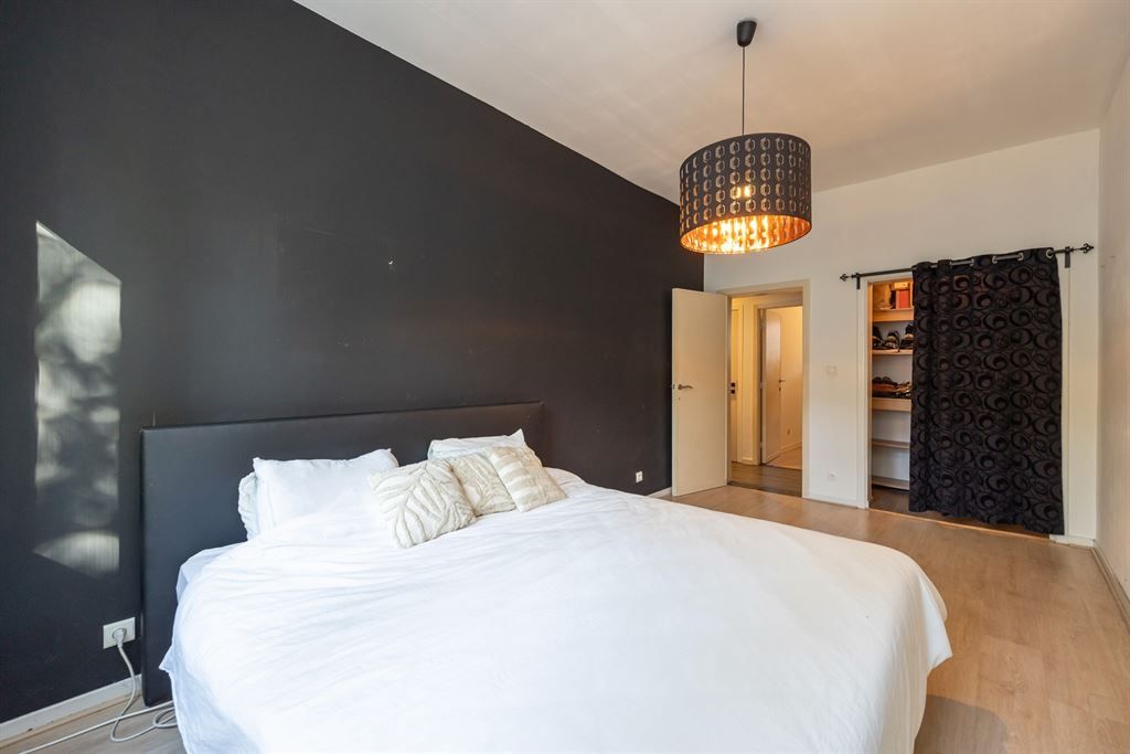 Instapklaar gelijkvloersappartement met stadskoer foto 11